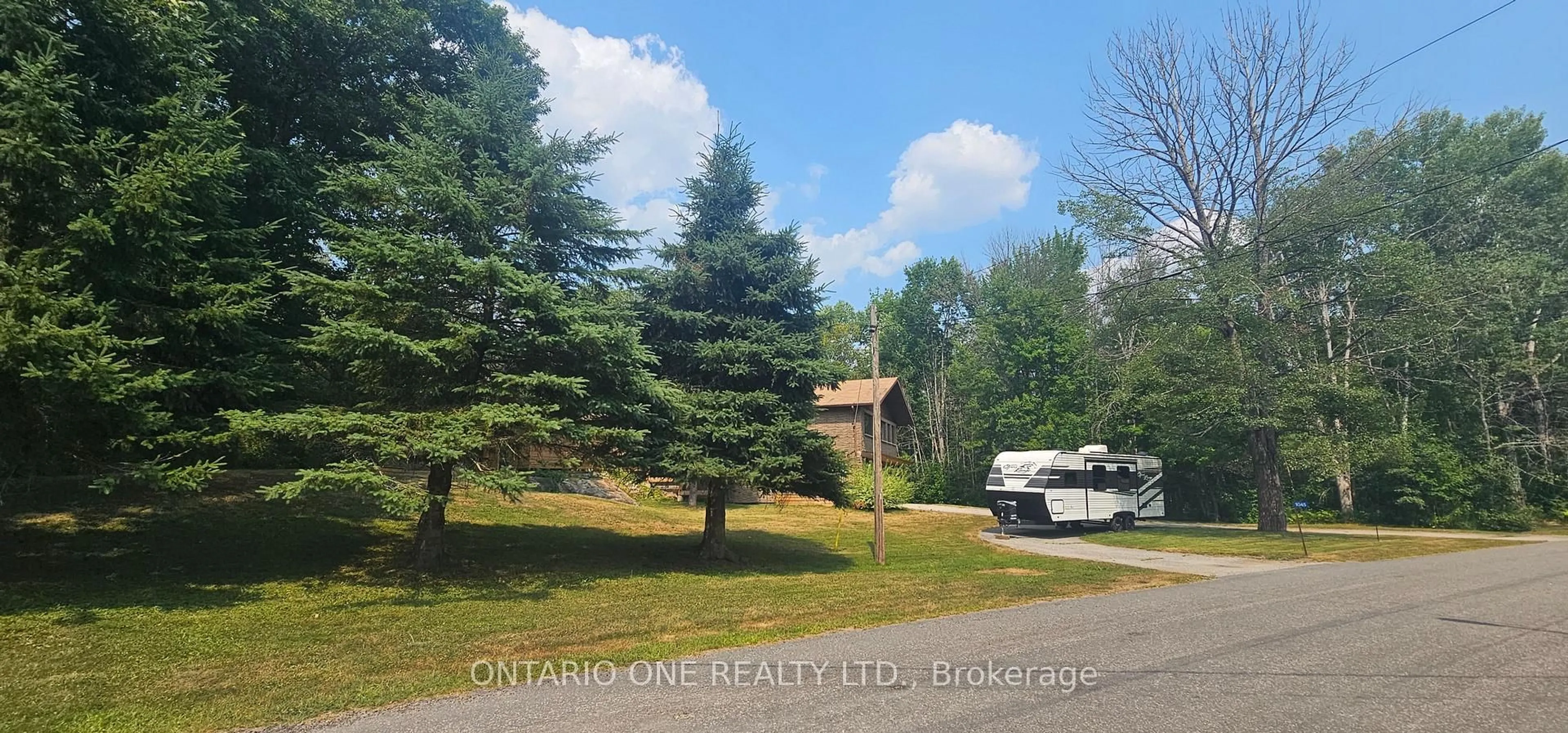 A pic from outside/outdoor area/front of a property/back of a property/a pic from drone, unknown for 1045 Cowbell Lane, Gravenhurst Ontario P0E 1N0