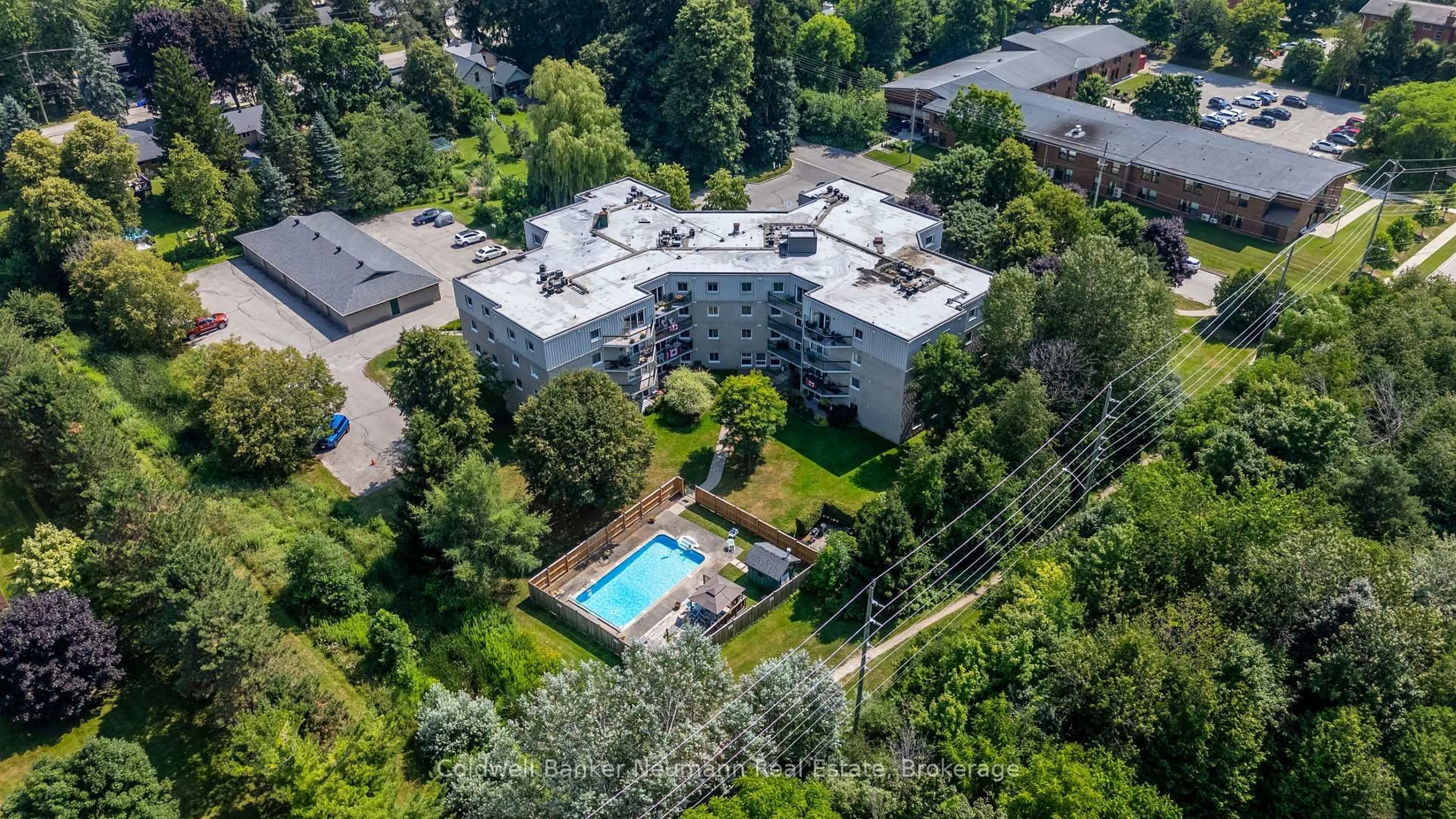 A pic from outside/outdoor area/front of a property/back of a property/a pic from drone, city buildings view from balcony for 200 River St #208, Centre Wellington Ontario N1M 3H8