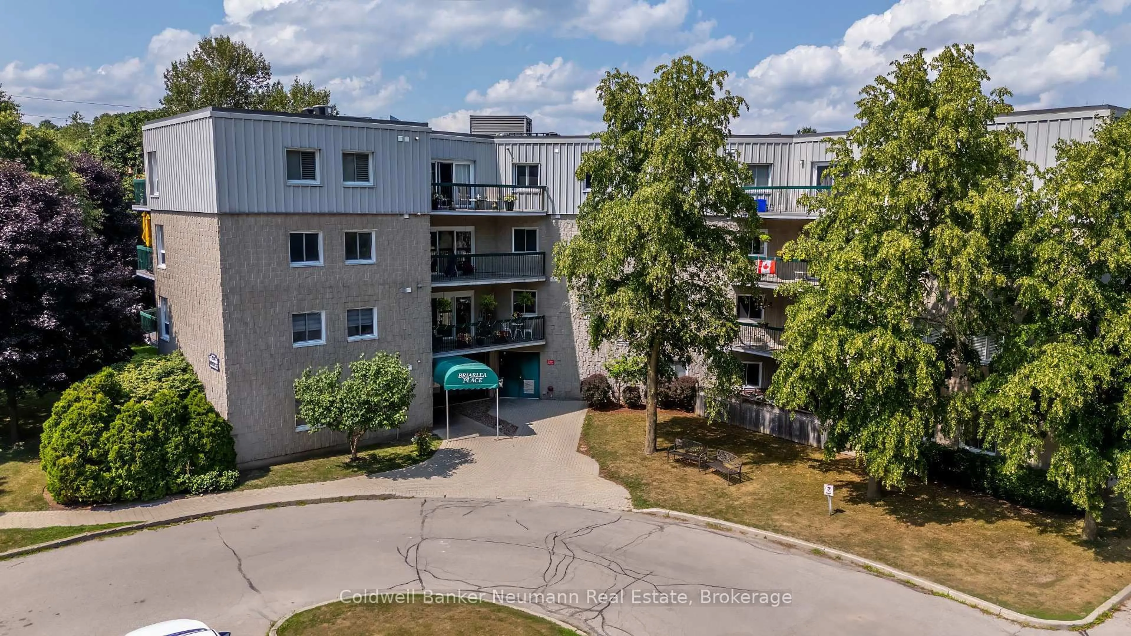 A pic from outside/outdoor area/front of a property/back of a property/a pic from drone, city buildings view from balcony for 200 River St #208, Centre Wellington Ontario N1M 3H8