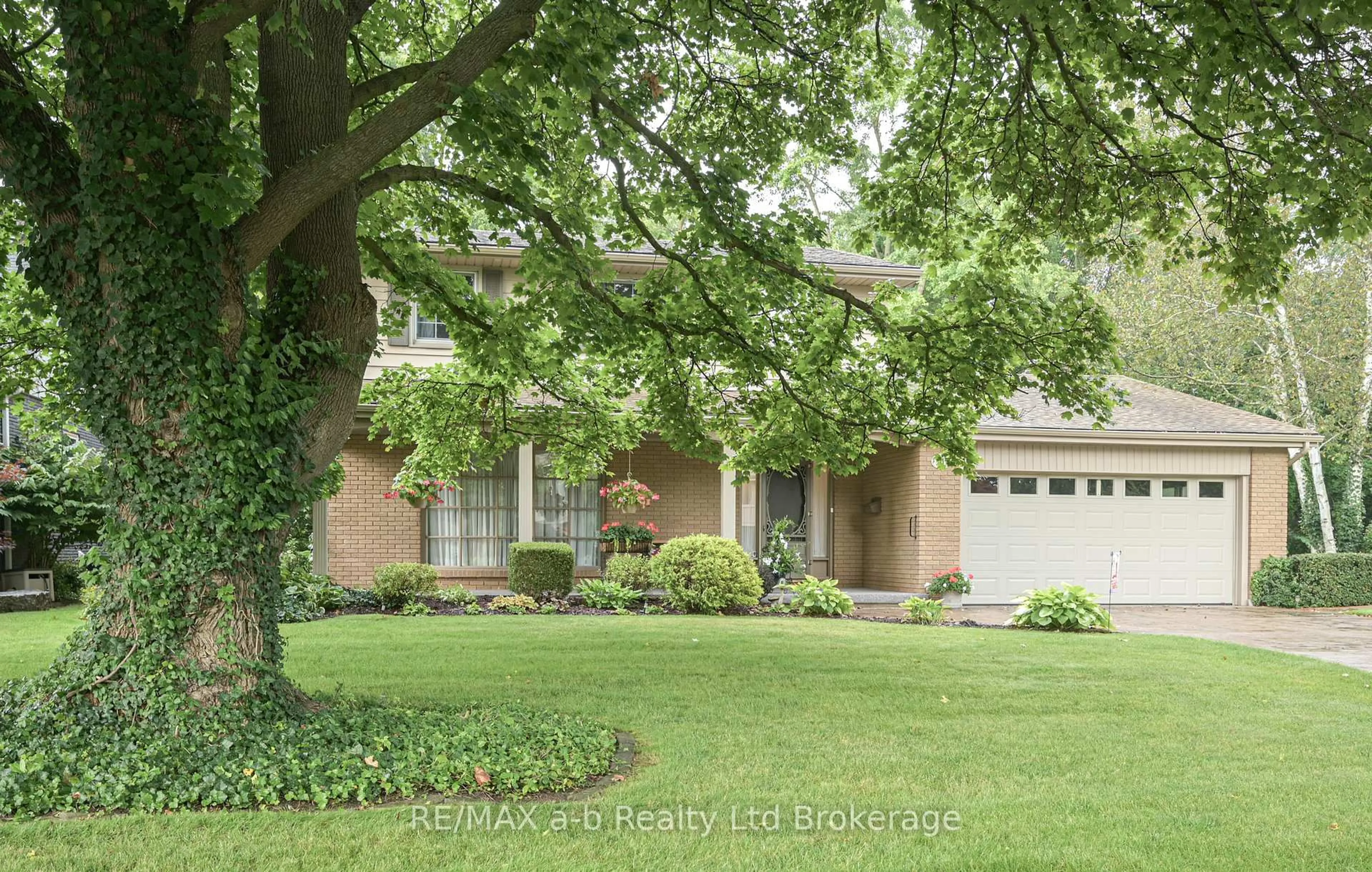 Home with brick exterior material, street for 41 Parkwood Dr, Tillsonburg Ontario N4G 2B7