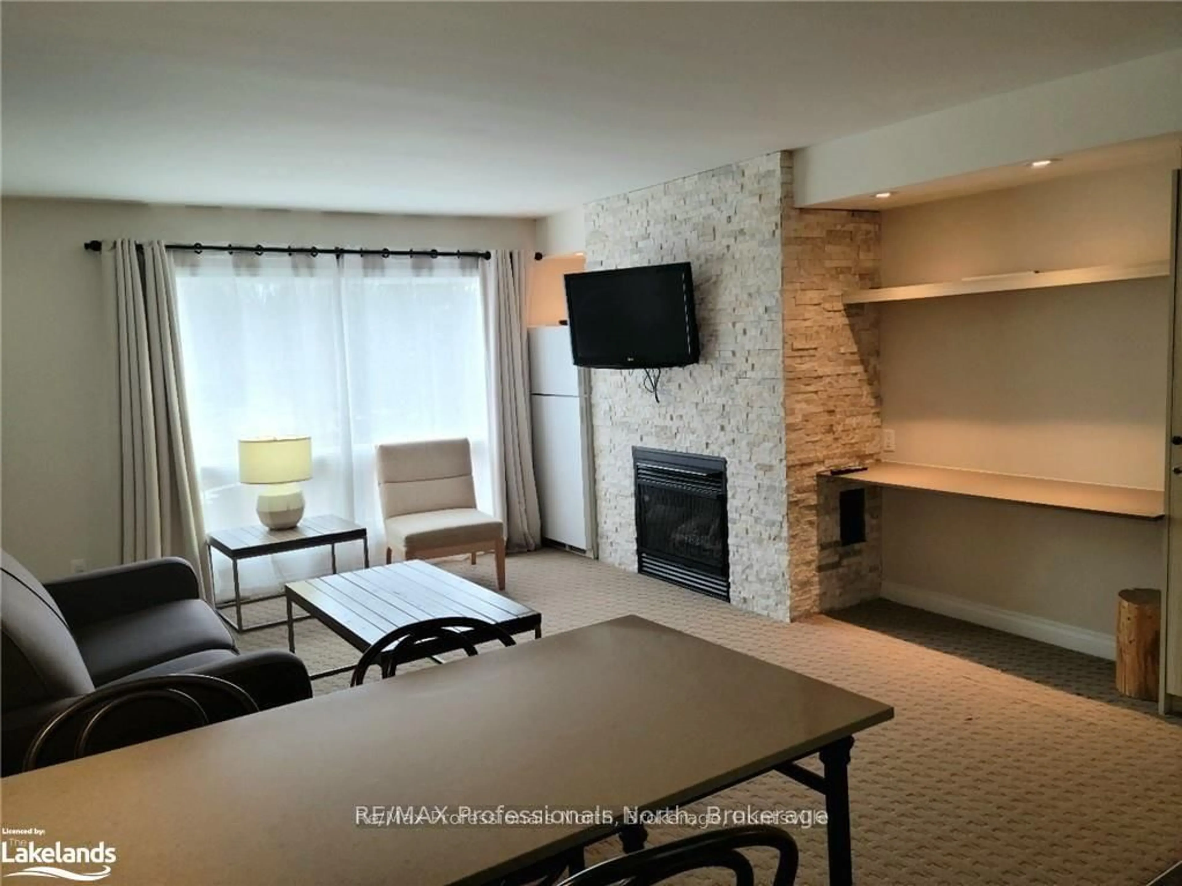 Living room with furniture, unknown for 1235 Deerhurst Dr #55-301, Huntsville Ontario P1H 2E8