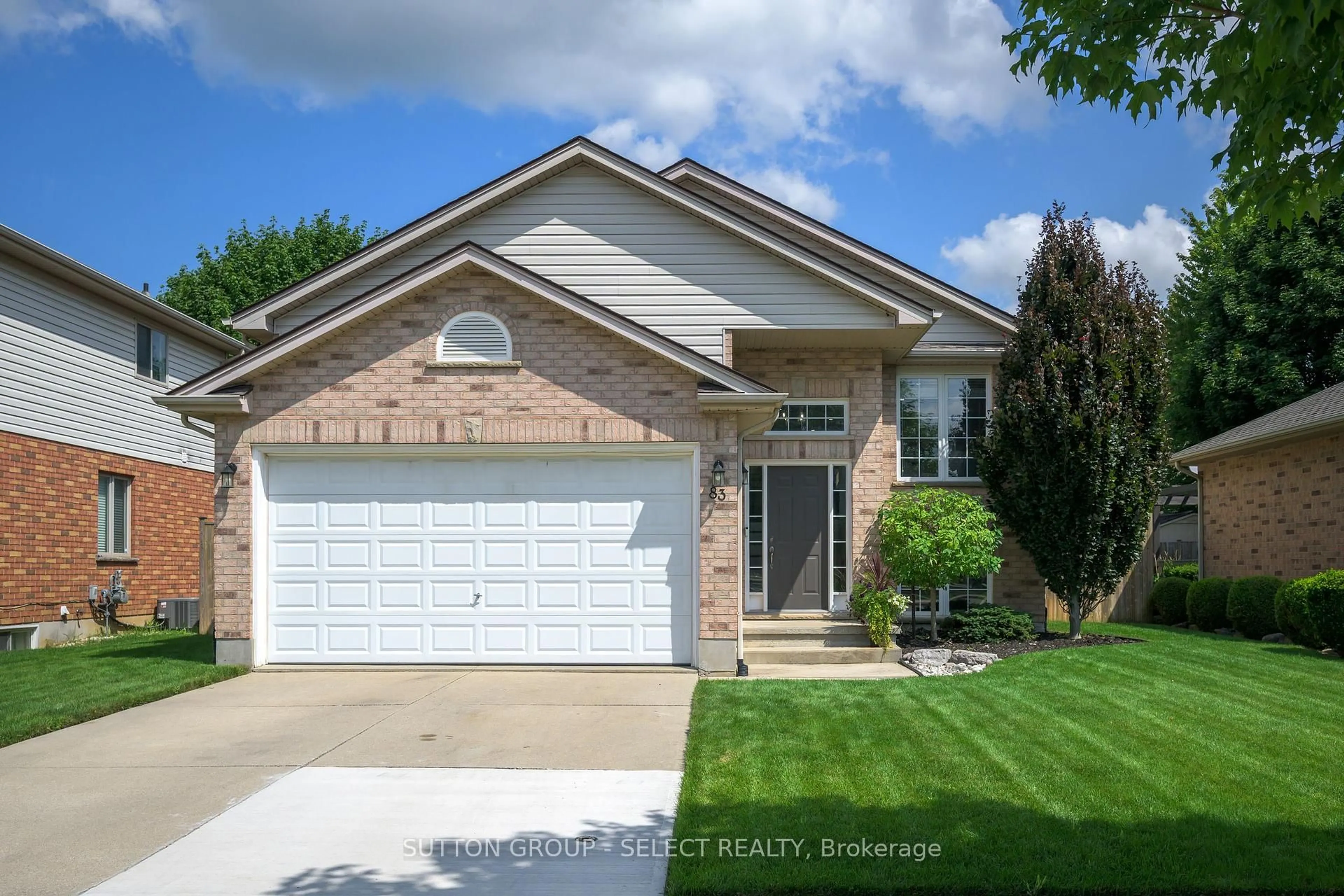 Home with vinyl exterior material, street for 83 MIDDLESEX Dr, Strathroy-Caradoc Ontario N7G 4G5