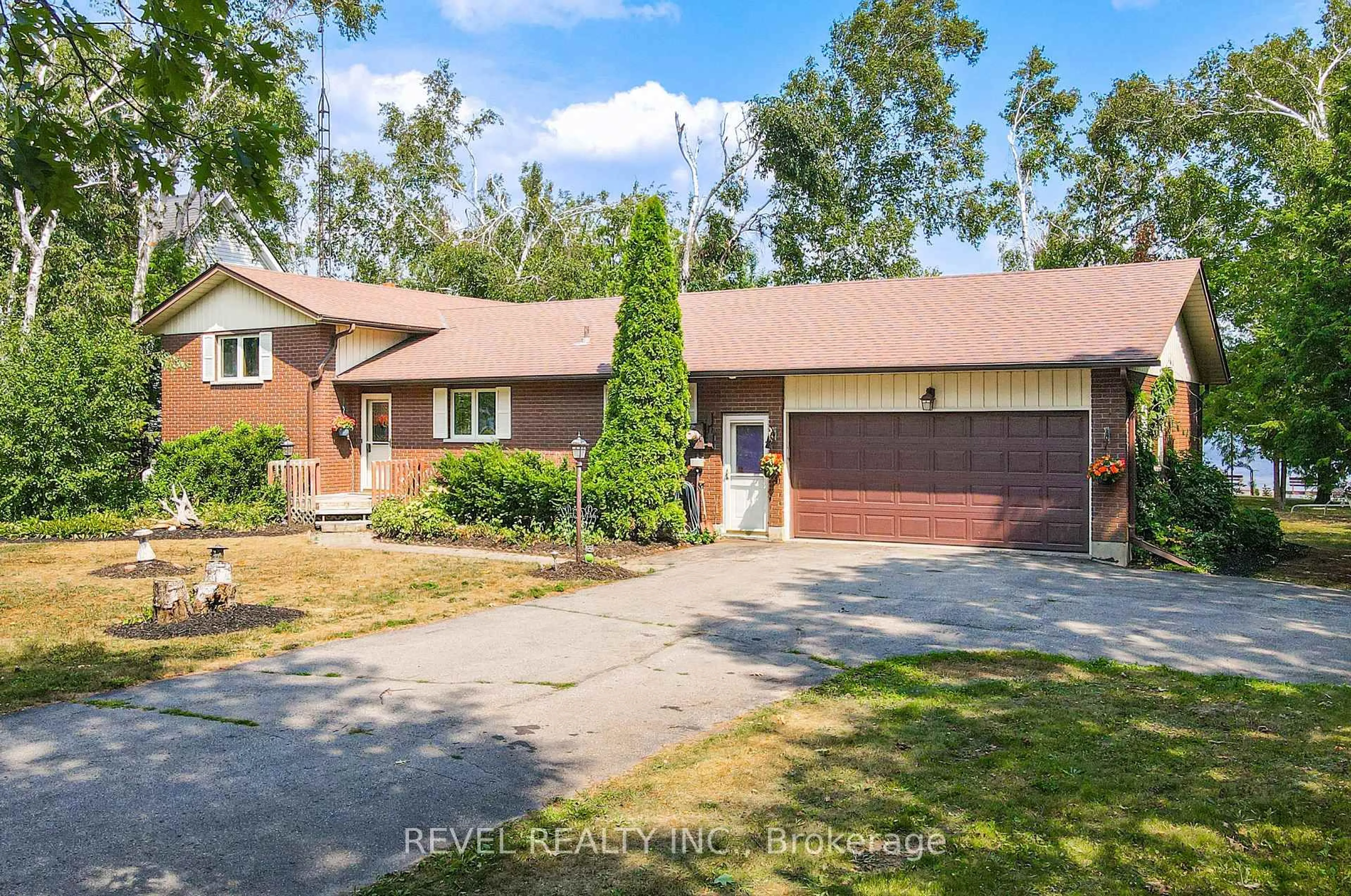 A pic from outside/outdoor area/front of a property/back of a property/a pic from drone, street for 126 Pinewood Blvd, Kawartha Lakes Ontario K0M 2T0