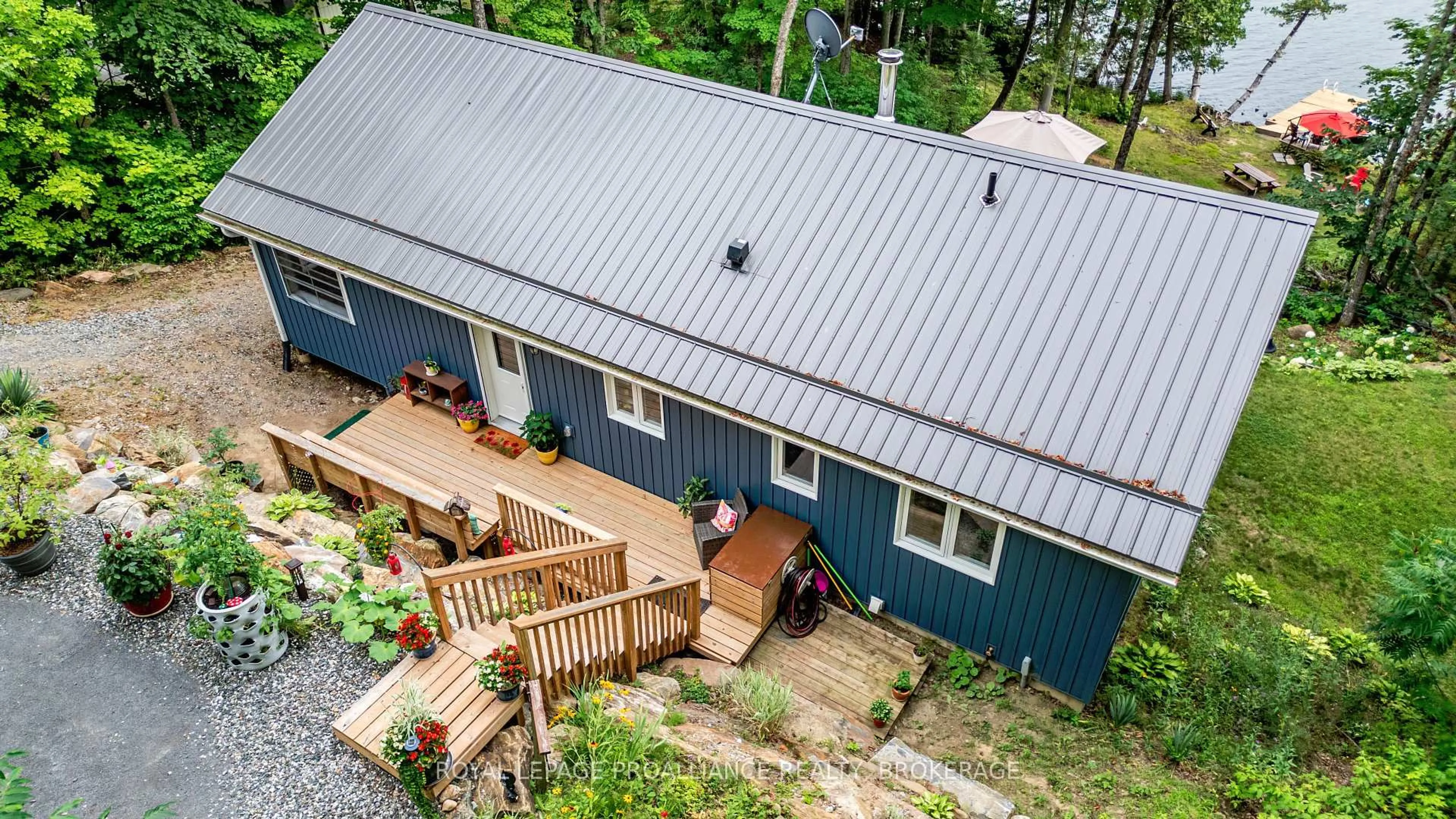 A pic from outside/outdoor area/front of a property/back of a property/a pic from drone, unknown for 1099 Almost Lane, Ardoch Ontario K0H 1C0