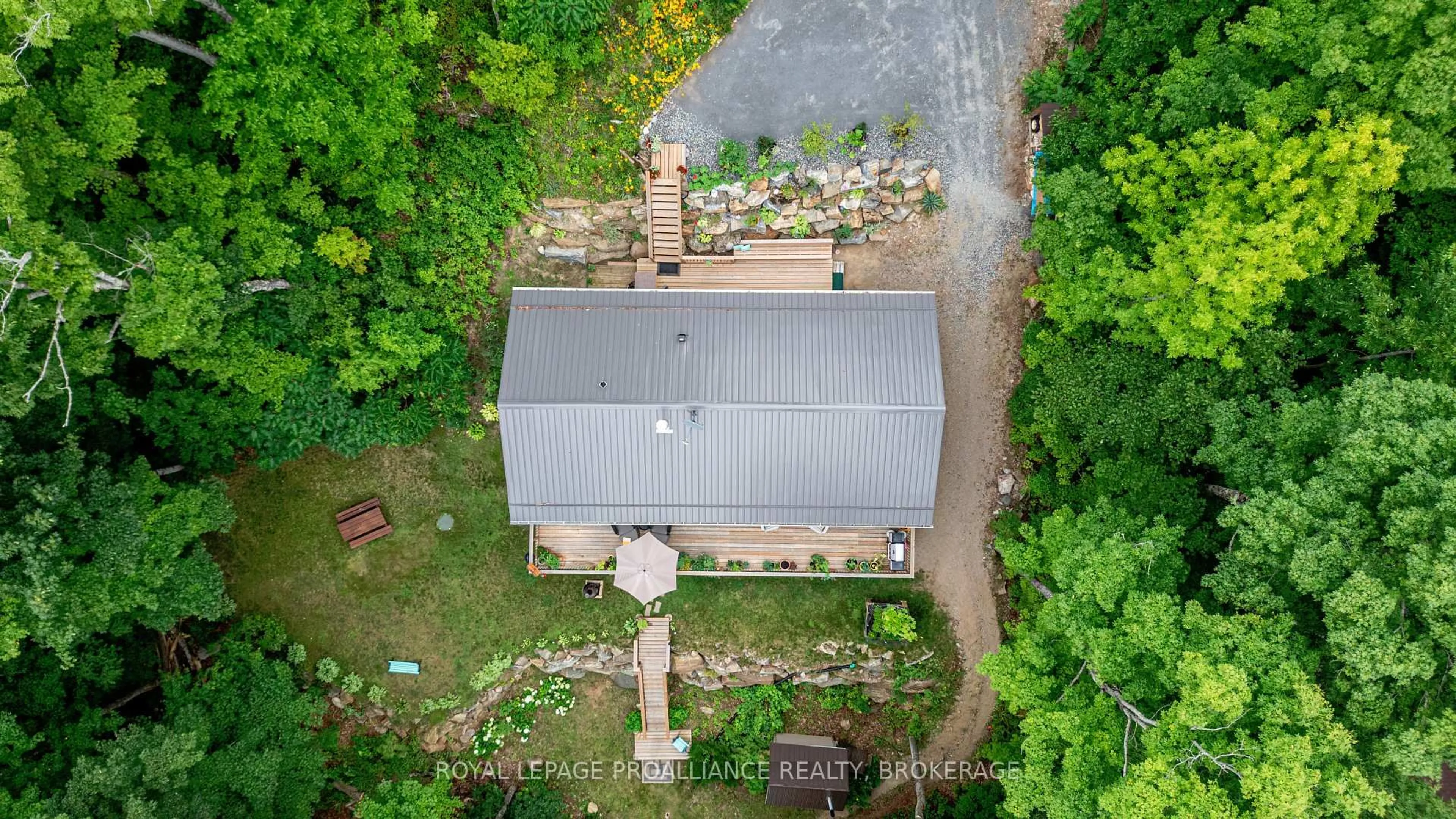 A pic from outside/outdoor area/front of a property/back of a property/a pic from drone, building for 1099 Almost Lane, Ardoch Ontario K0H 1C0