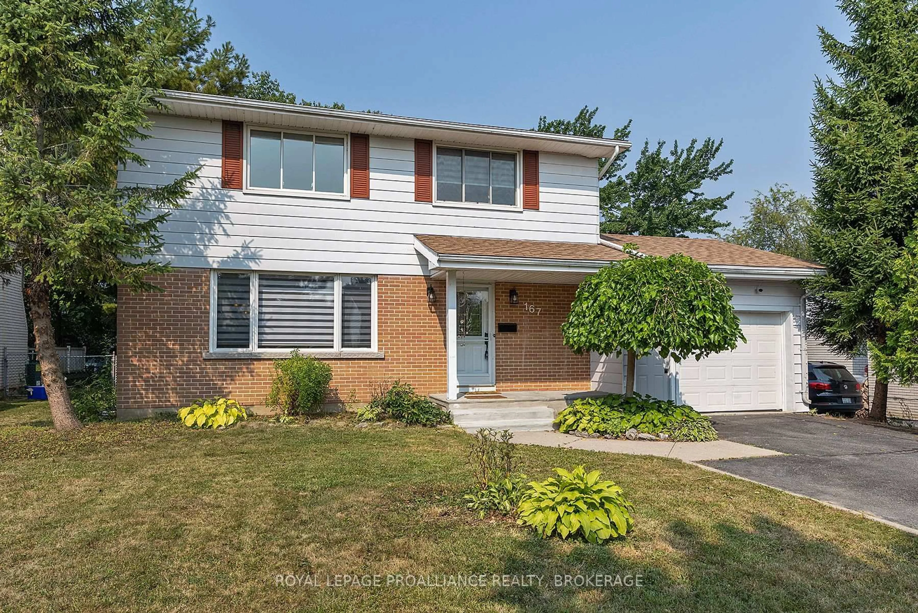 Home with vinyl exterior material, street for 167 Braemar Rd, Kingston Ontario K7M 4B7