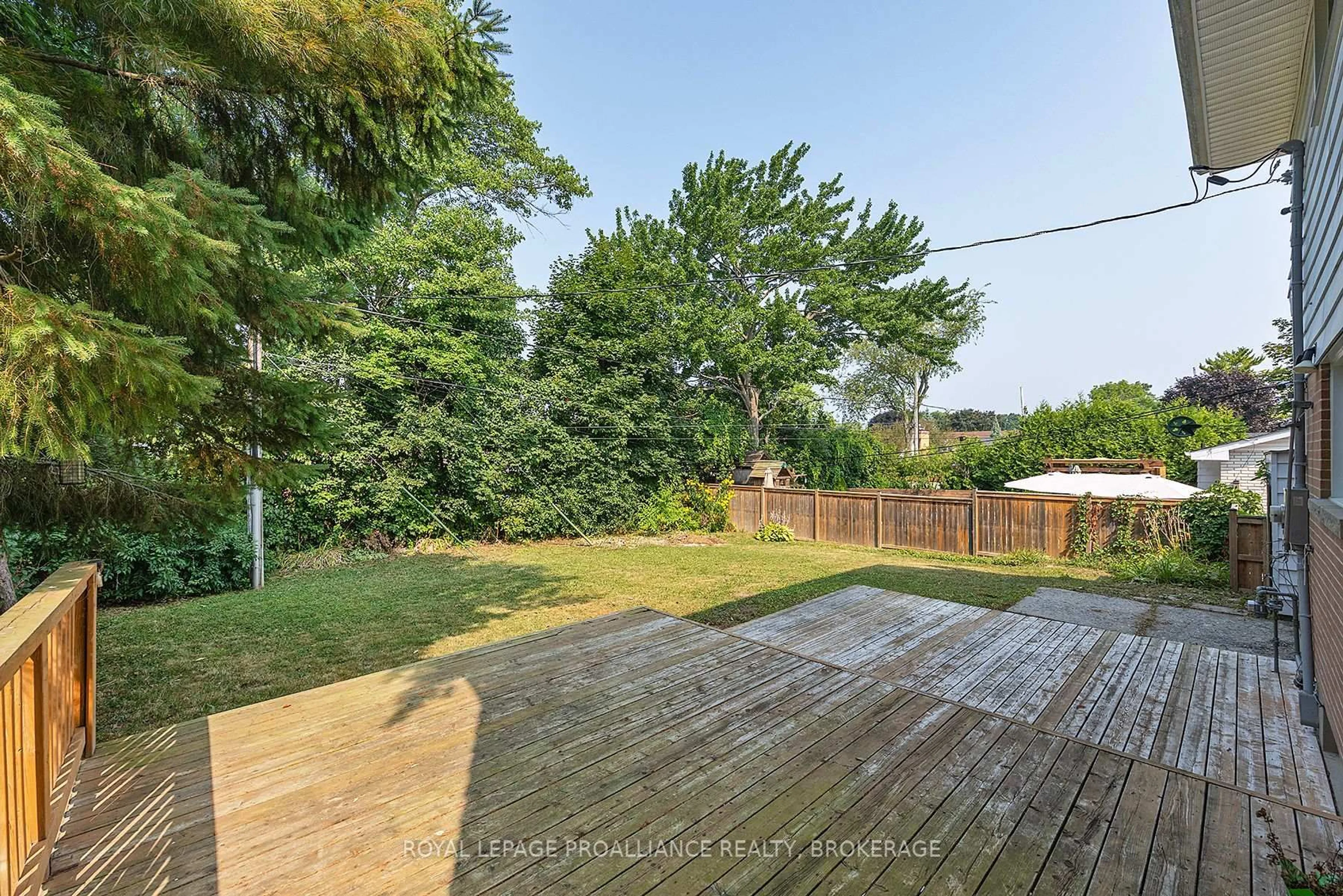 A pic from outside/outdoor area/front of a property/back of a property/a pic from drone, forest/trees view for 167 Braemar Rd, Kingston Ontario K7M 4B7