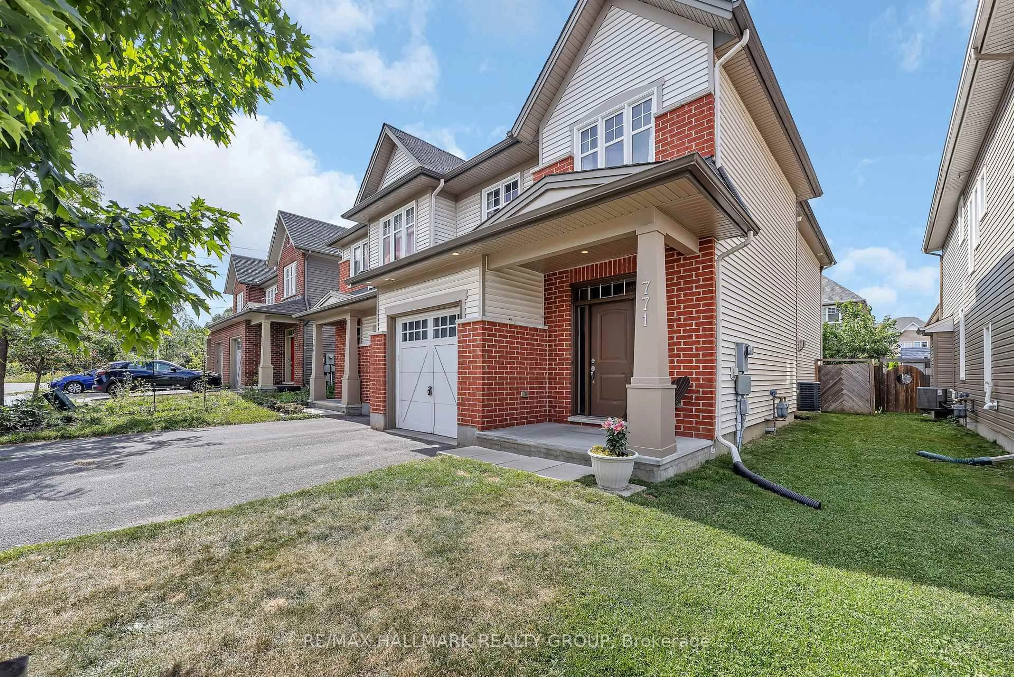 Home with brick exterior material, street for 771 Hazelnut Cres, Ottawa Ontario K1T 3T8