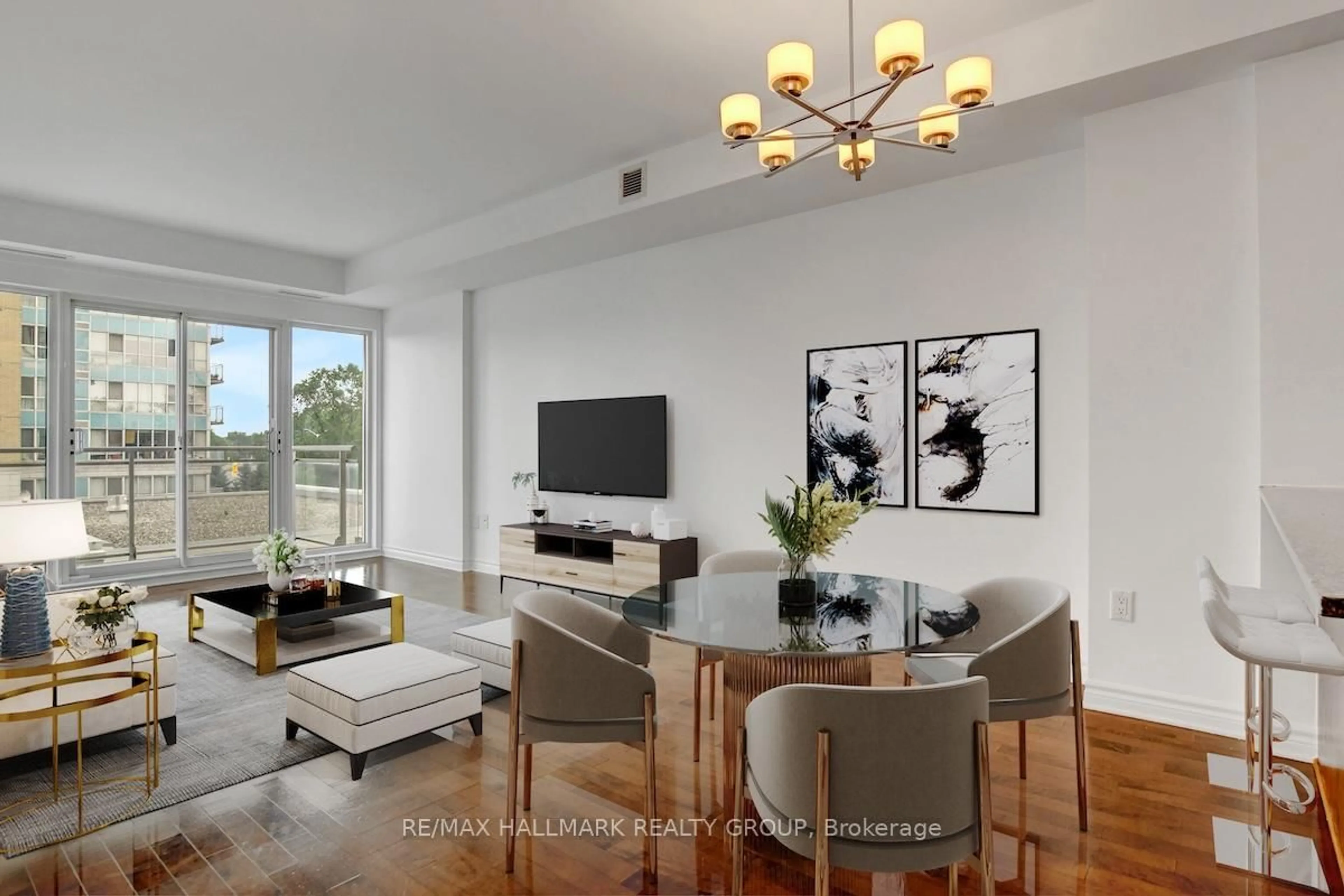 Living room with furniture, wood/laminate floor for 70 Landry St #303, Ottawa Ontario K1L 0A8