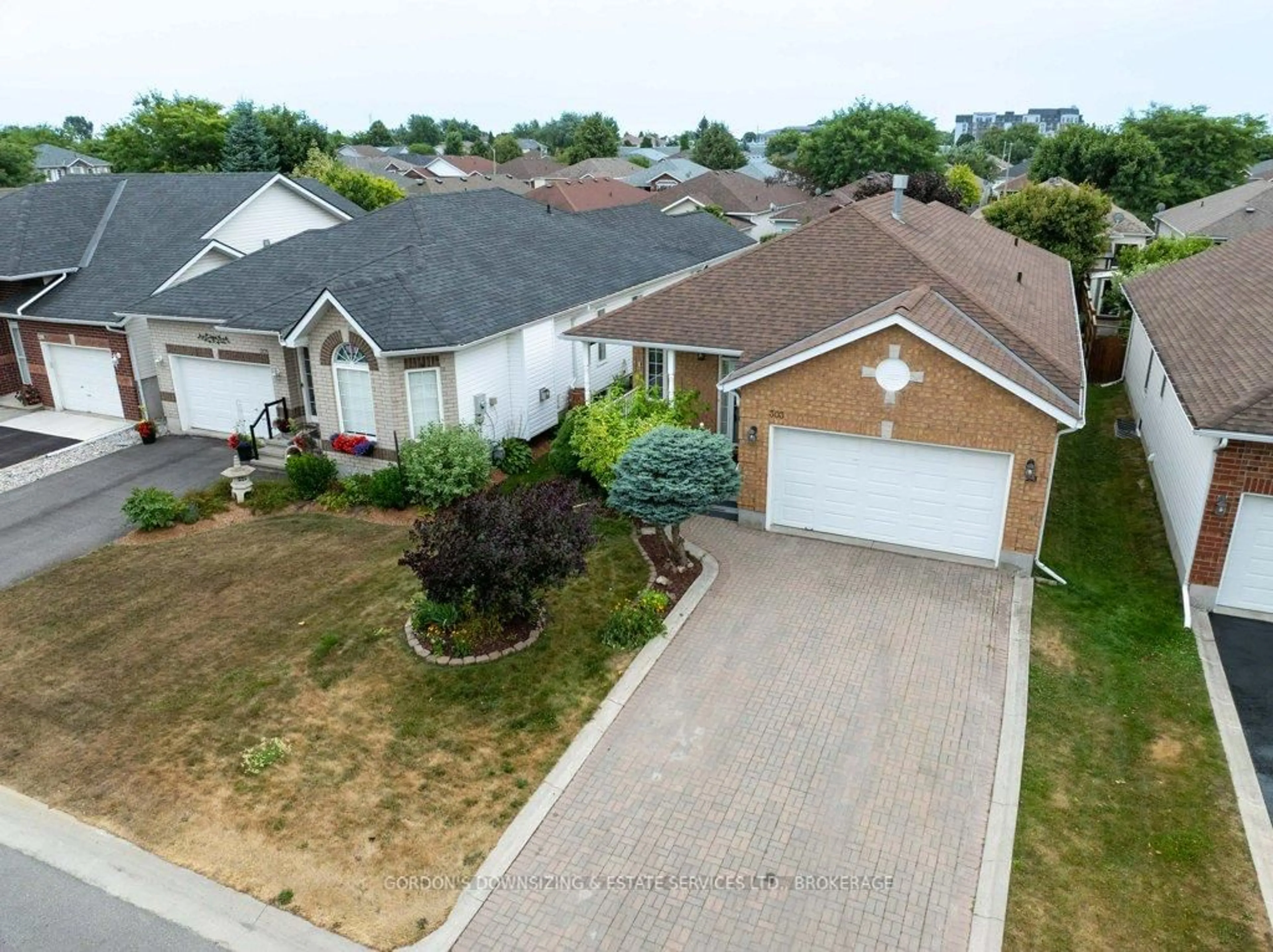 A pic from outside/outdoor area/front of a property/back of a property/a pic from drone, street for 303 Cavendish Cres, Kingston Ontario K7P 3E2