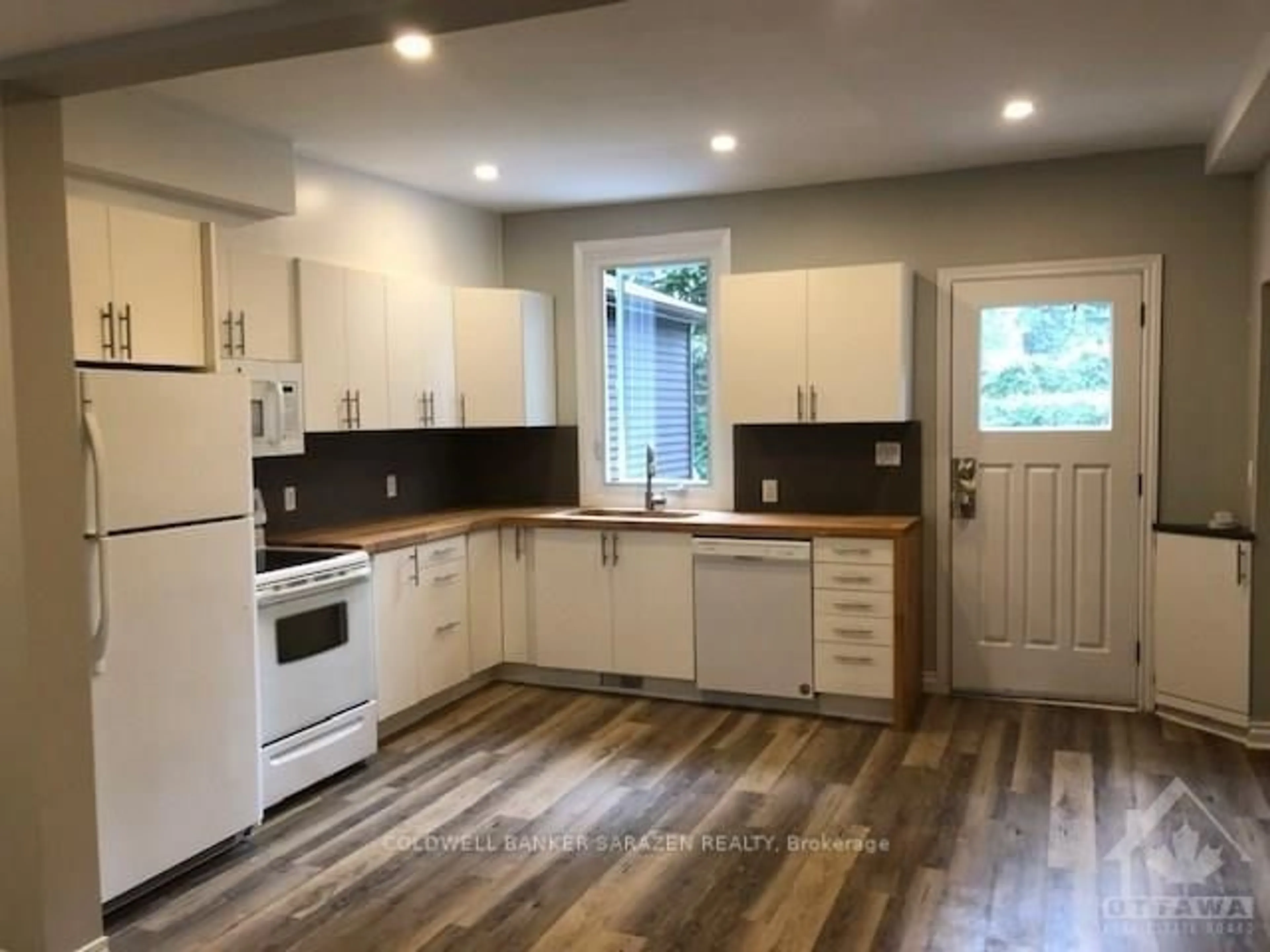 Open concept kitchen, wood/laminate floor for 5 EDGAR St, Ottawa Ontario K1Y 3L4