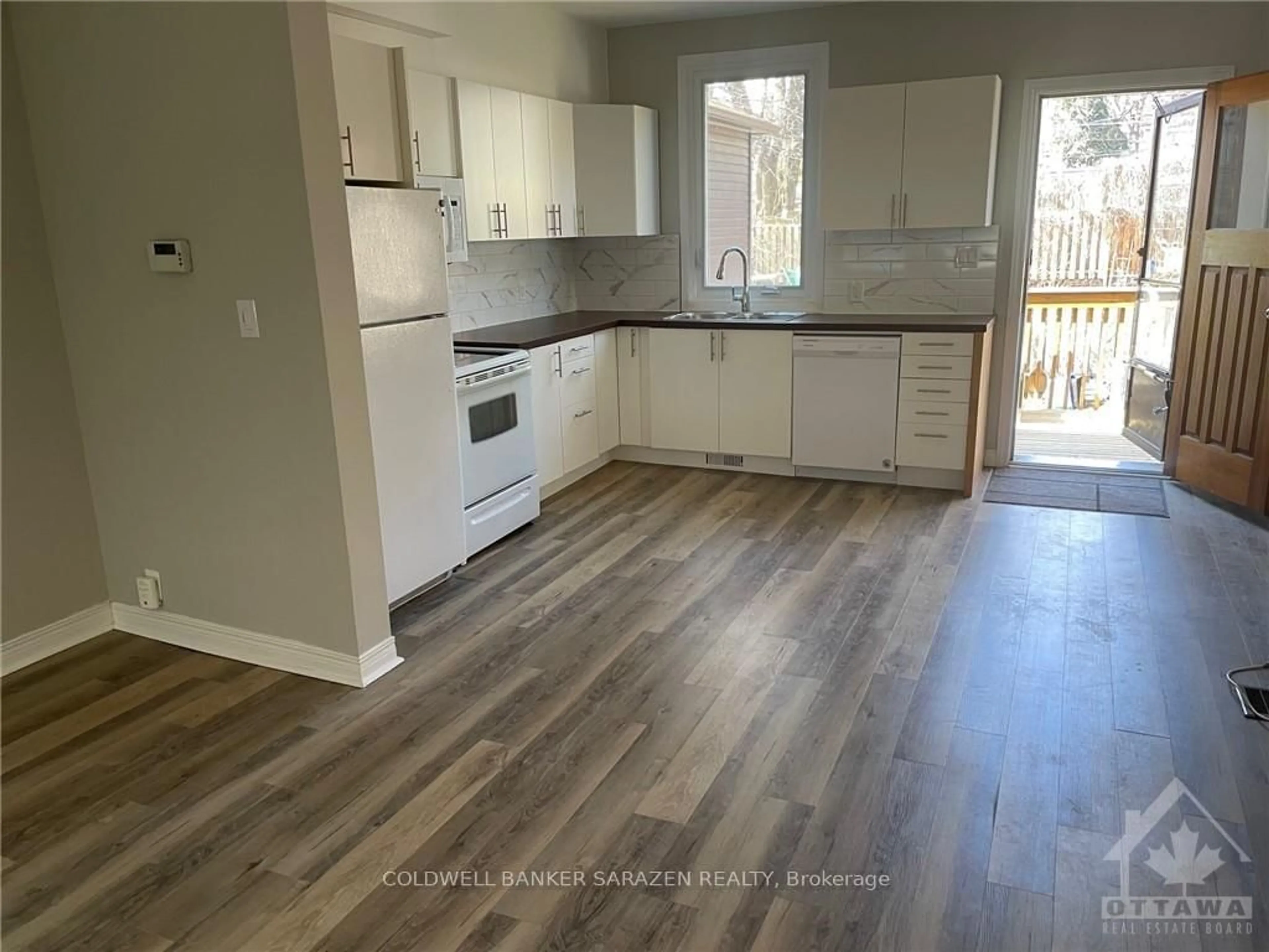 Open concept kitchen, wood/laminate floor for 5 EDGAR St, Ottawa Ontario K1Y 3L4