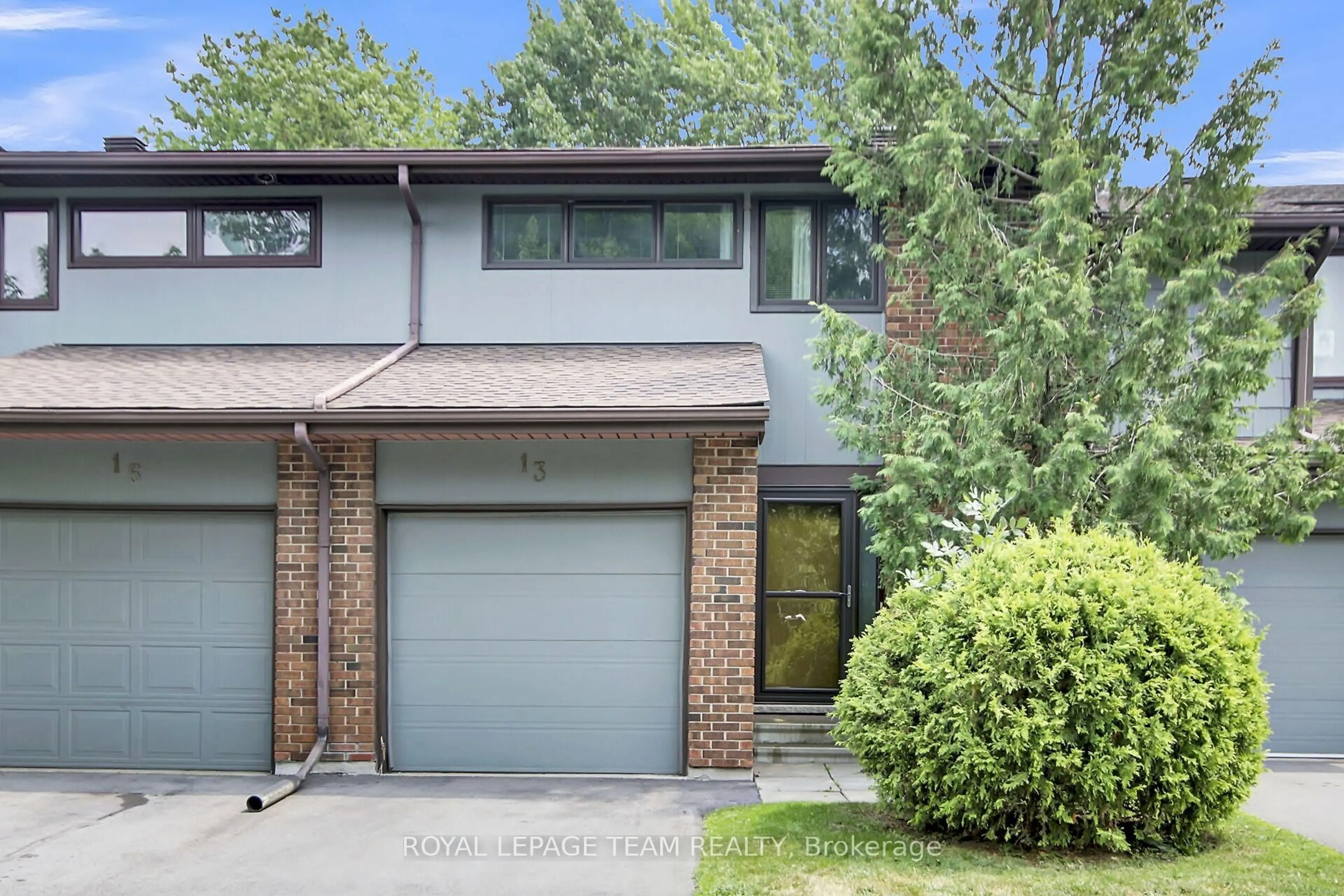 Home with brick exterior material, street for 13 Bethune Way, Kanata Ontario K2K 1C2