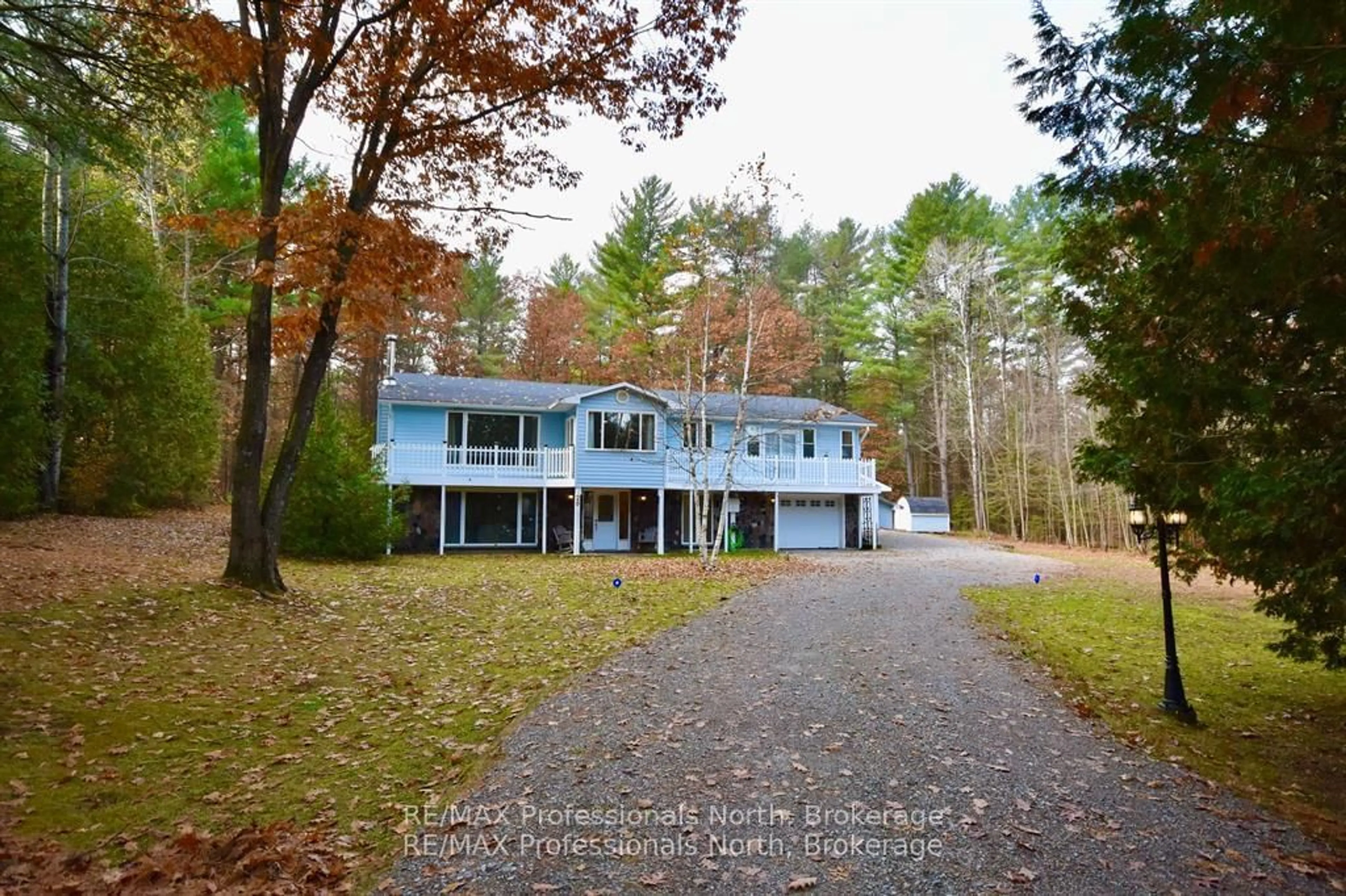 A pic from outside/outdoor area/front of a property/back of a property/a pic from drone, unknown for 20 Coulter Lane, Bracebridge Ontario P1P 1R1