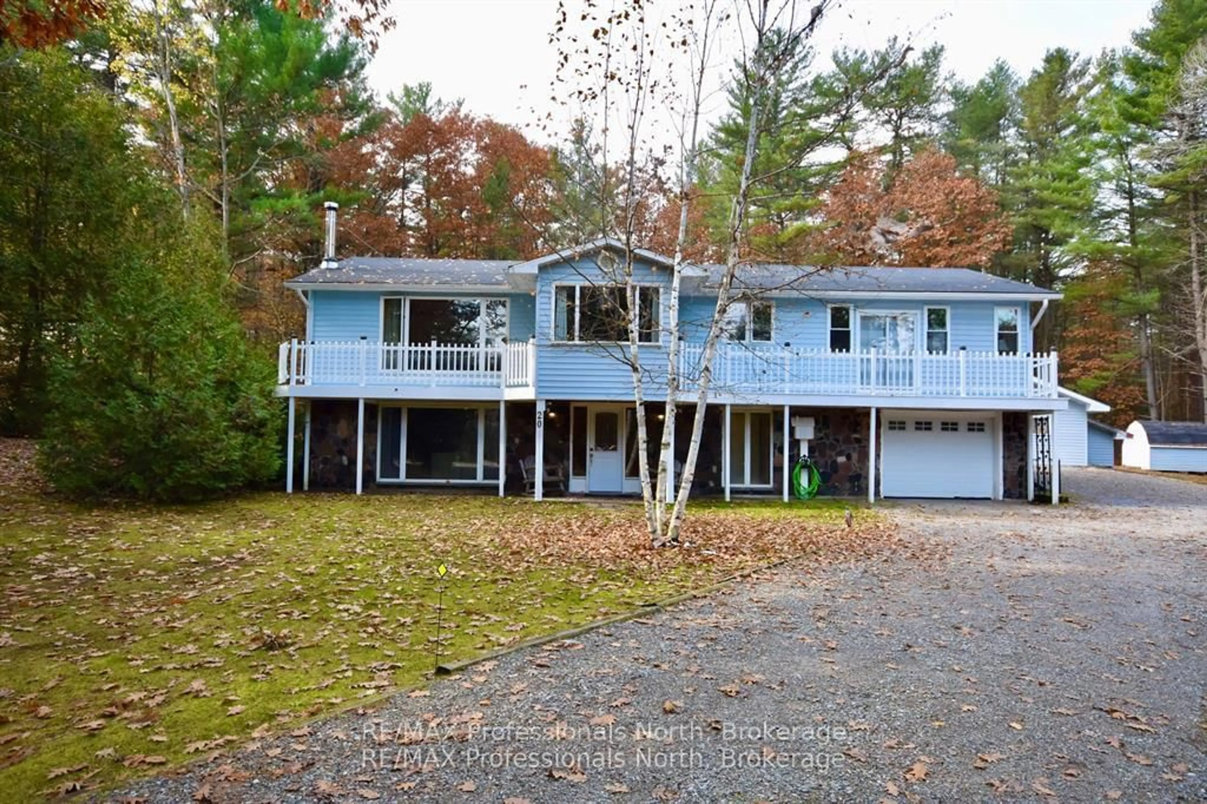A pic from outside/outdoor area/front of a property/back of a property/a pic from drone, unknown for 20 Coulter Lane, Bracebridge Ontario P1P 1R1