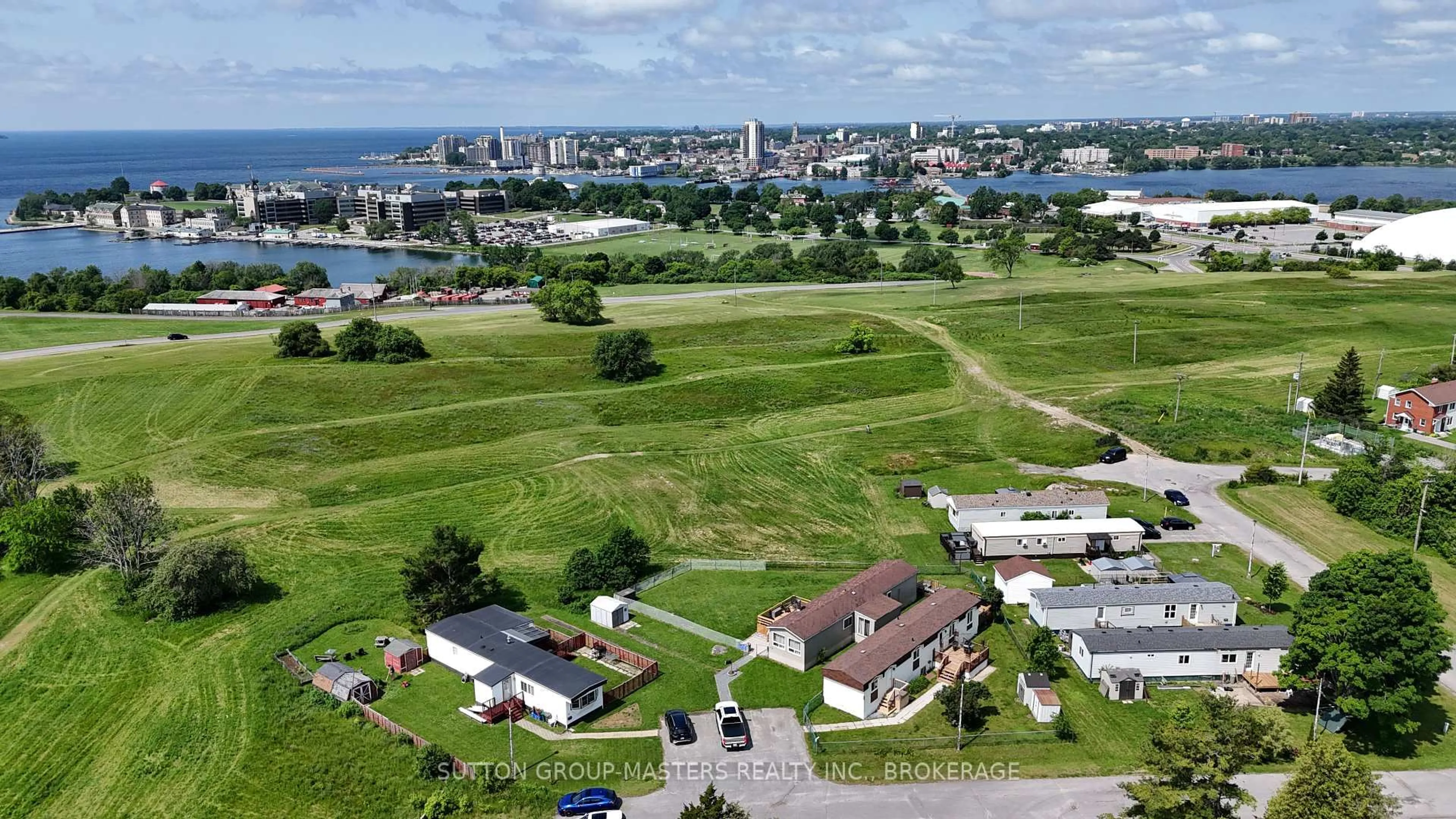 A pic from outside/outdoor area/front of a property/back of a property/a pic from drone, water/lake/river/ocean view for 30 Kapyong Cres, Kingston Ontario K7K 5T5