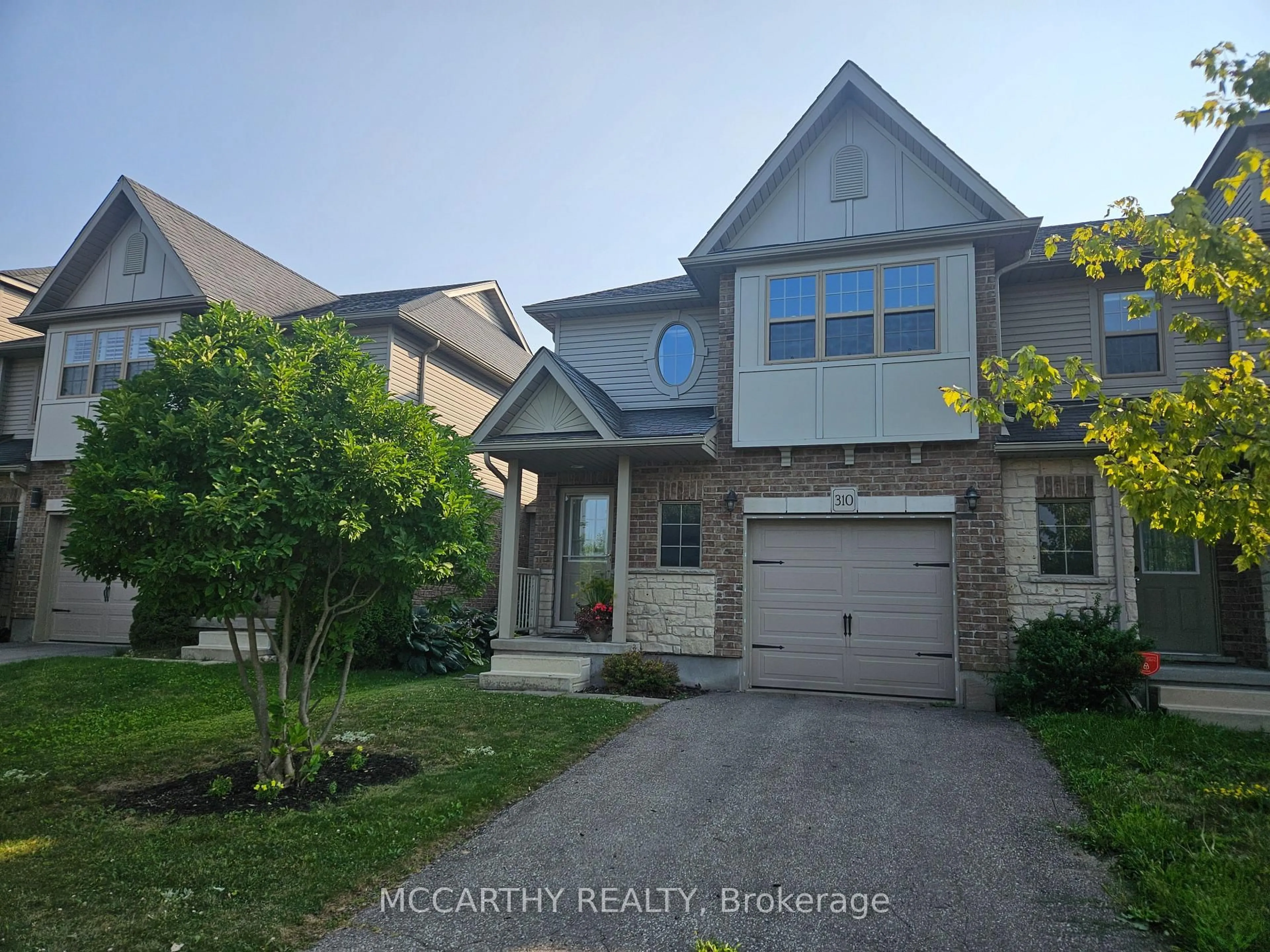 A pic from outside/outdoor area/front of a property/back of a property/a pic from drone, street for 310 SEVERN Dr, Guelph Ontario N1E 0R9
