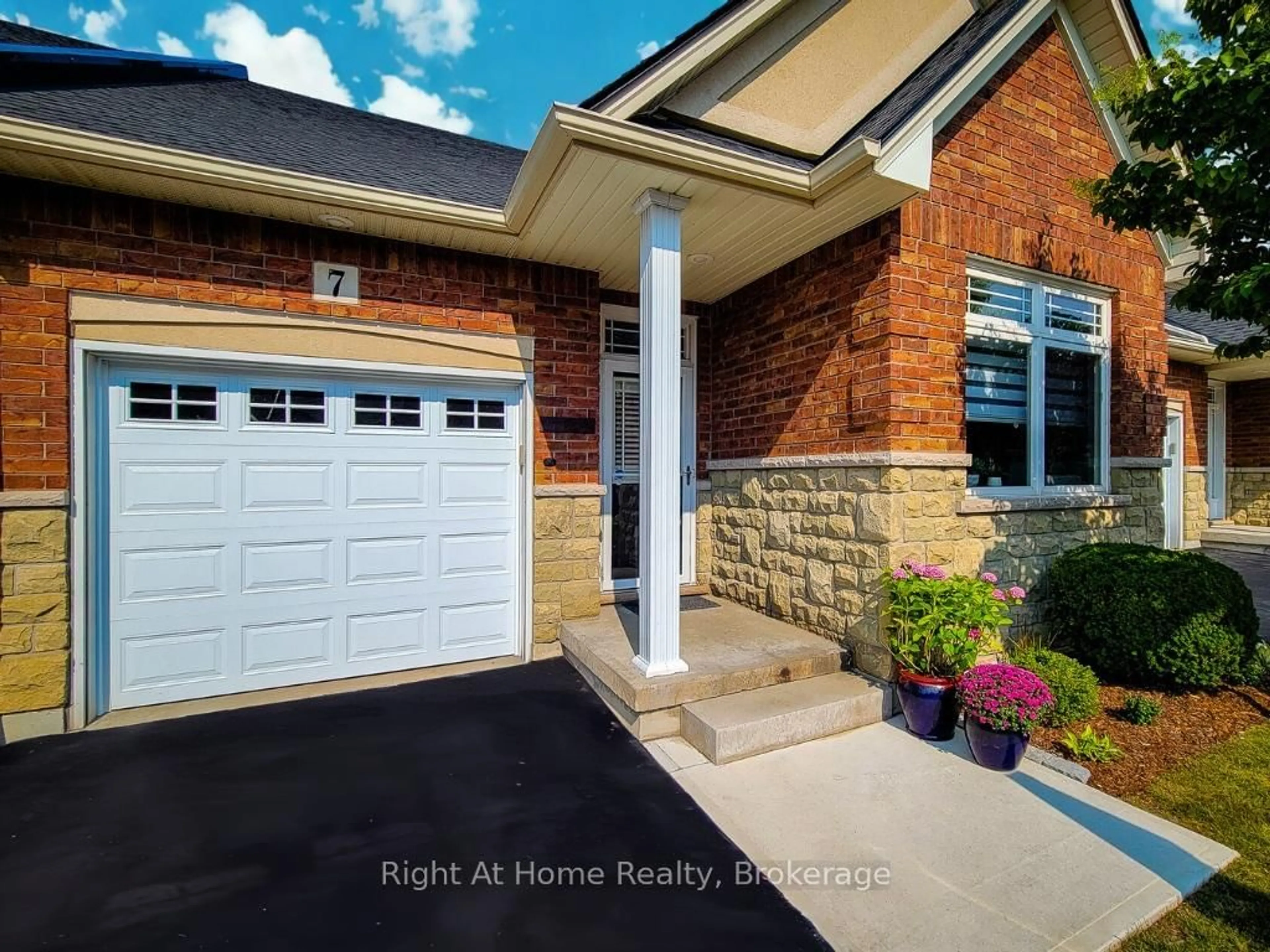 Home with brick exterior material, street for 7 Landscapes Tr, Hamilton Ontario L9K 0A1