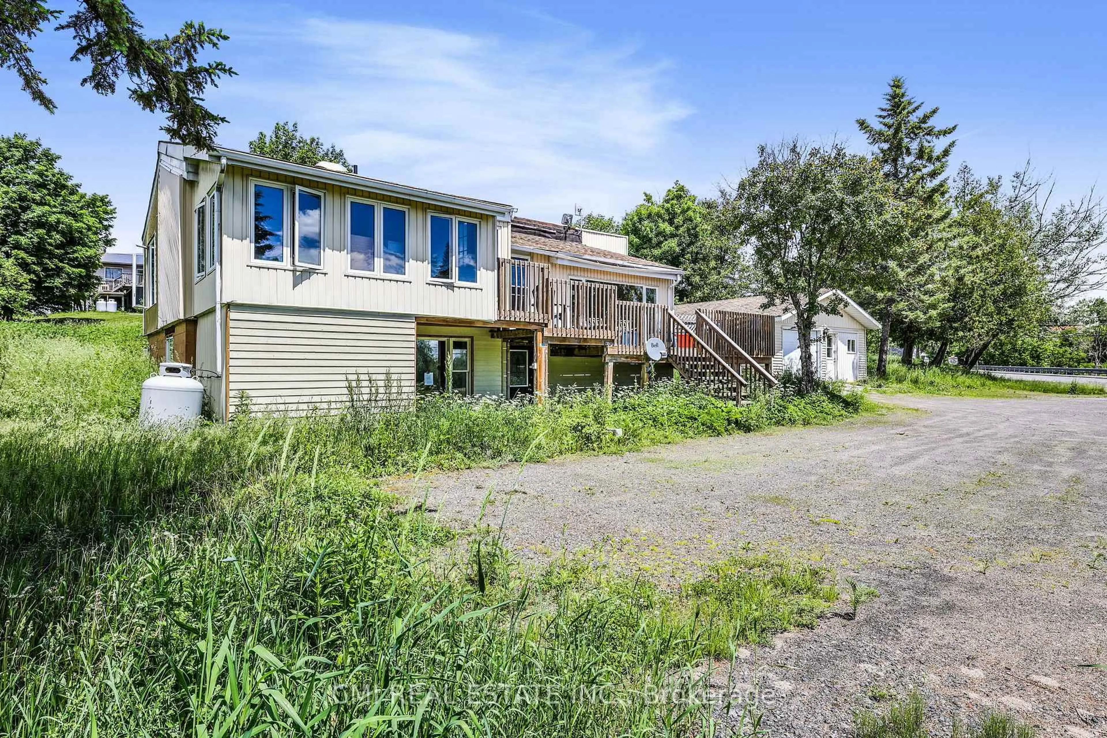 A pic from outside/outdoor area/front of a property/back of a property/a pic from drone, street for 678 HWY 124, McKellar Ontario P2A 1K2