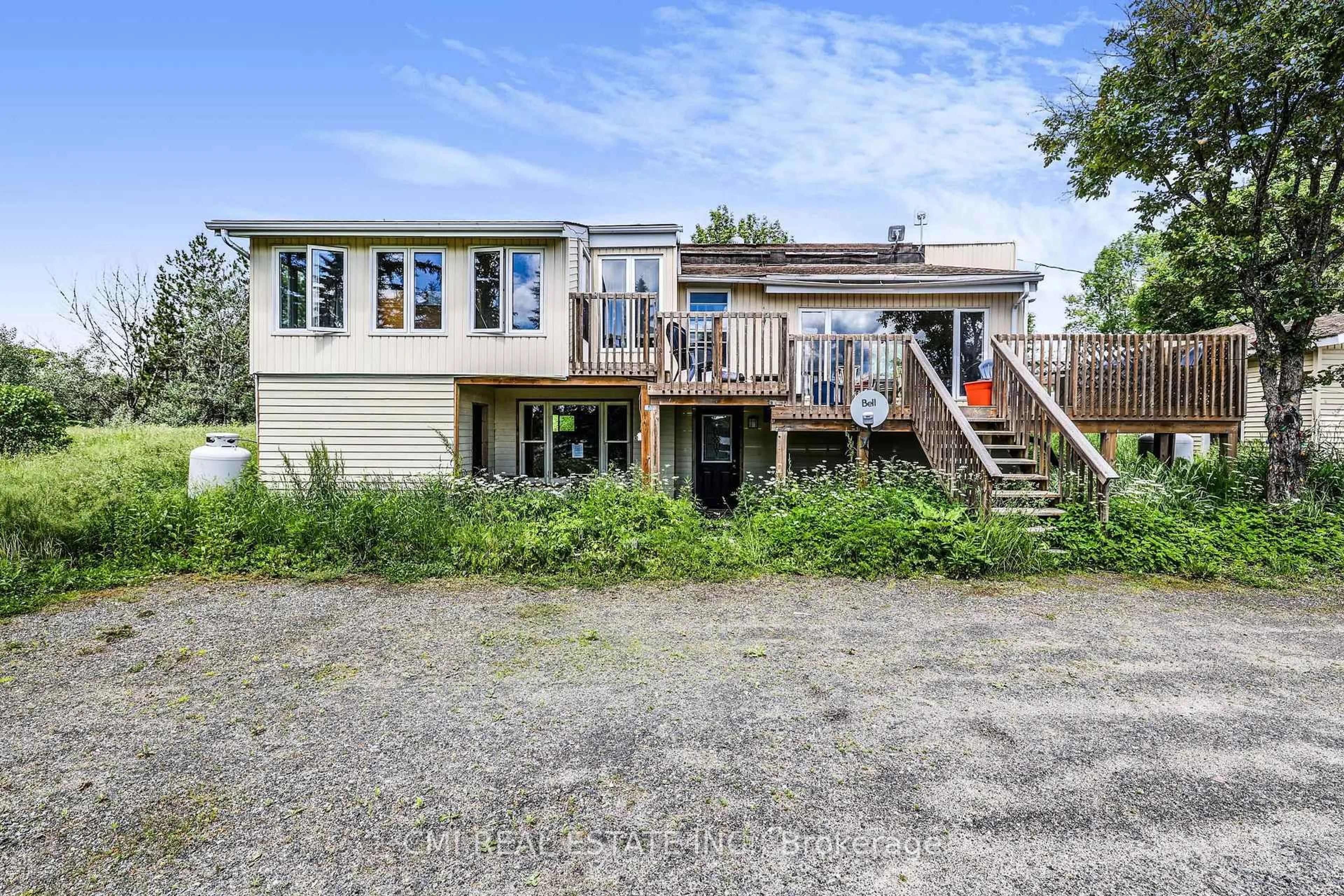 A pic from outside/outdoor area/front of a property/back of a property/a pic from drone, unknown for 678 HWY 124, McKellar Ontario P2A 1K2
