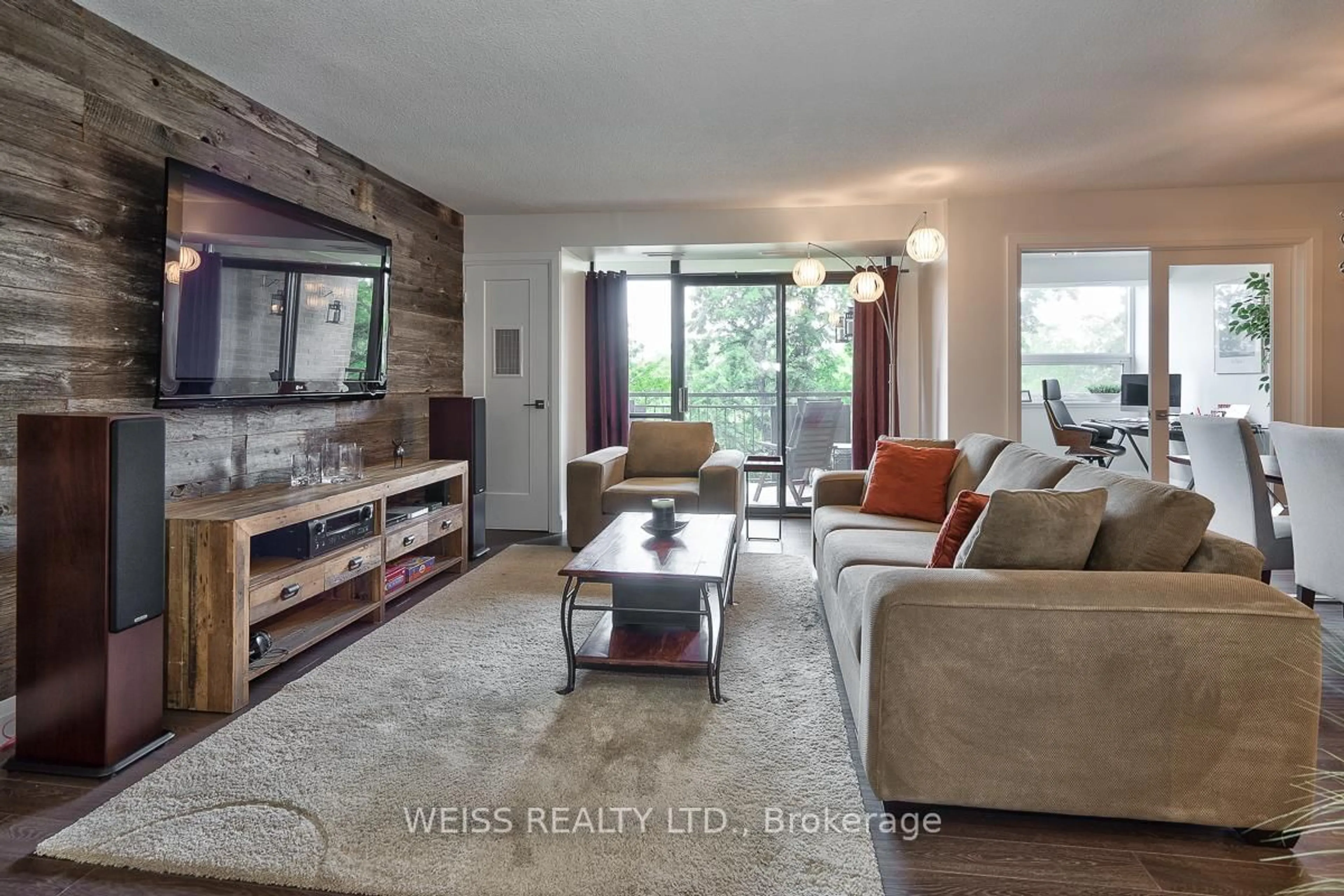 Living room with furniture, unknown for 500 Green Rd #402, Hamilton Ontario L8E 3M6