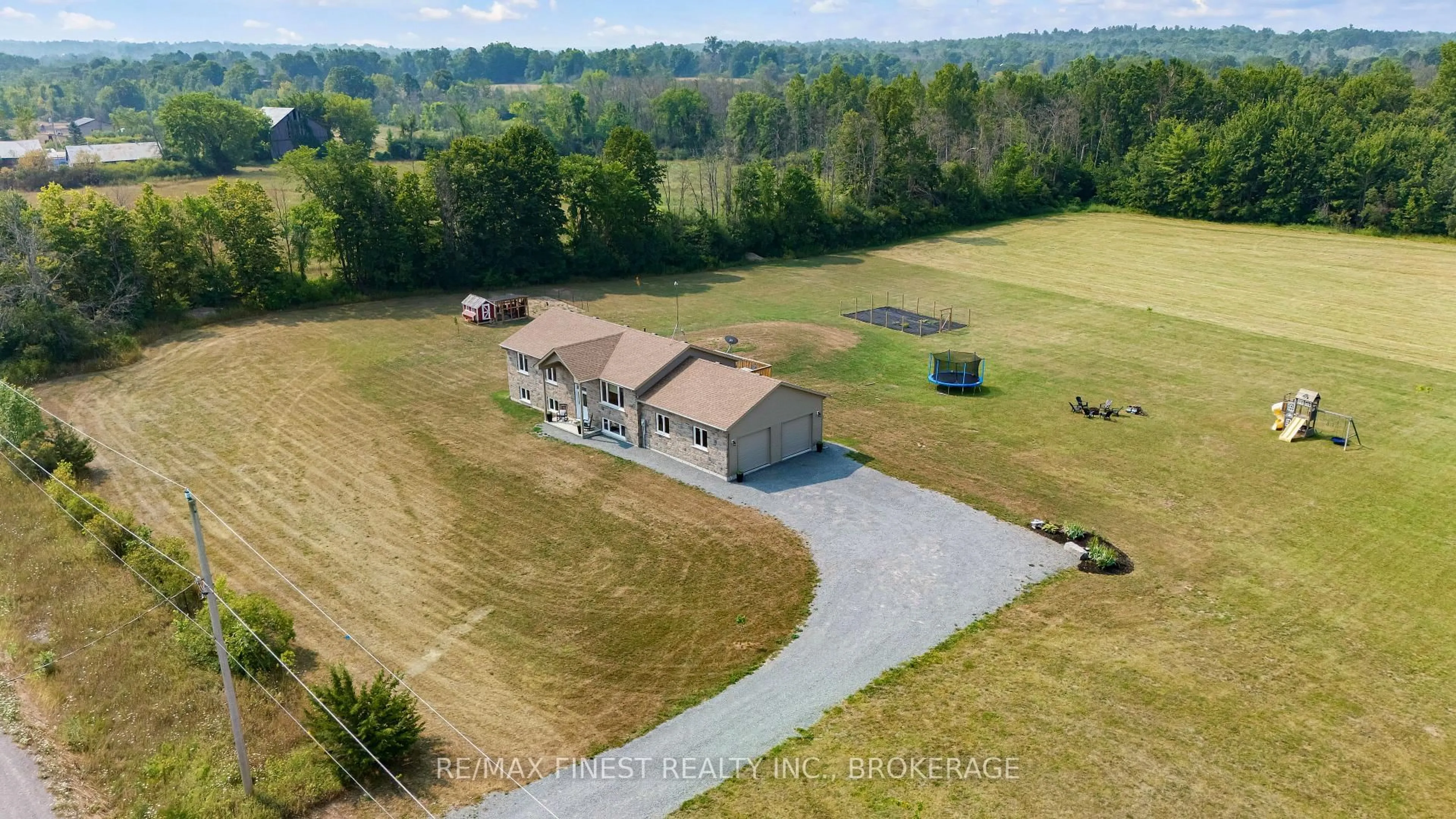 A pic from outside/outdoor area/front of a property/back of a property/a pic from drone, water/lake/river/ocean view for 441 Petworth Rd, Yarker Ontario K0K 3N0