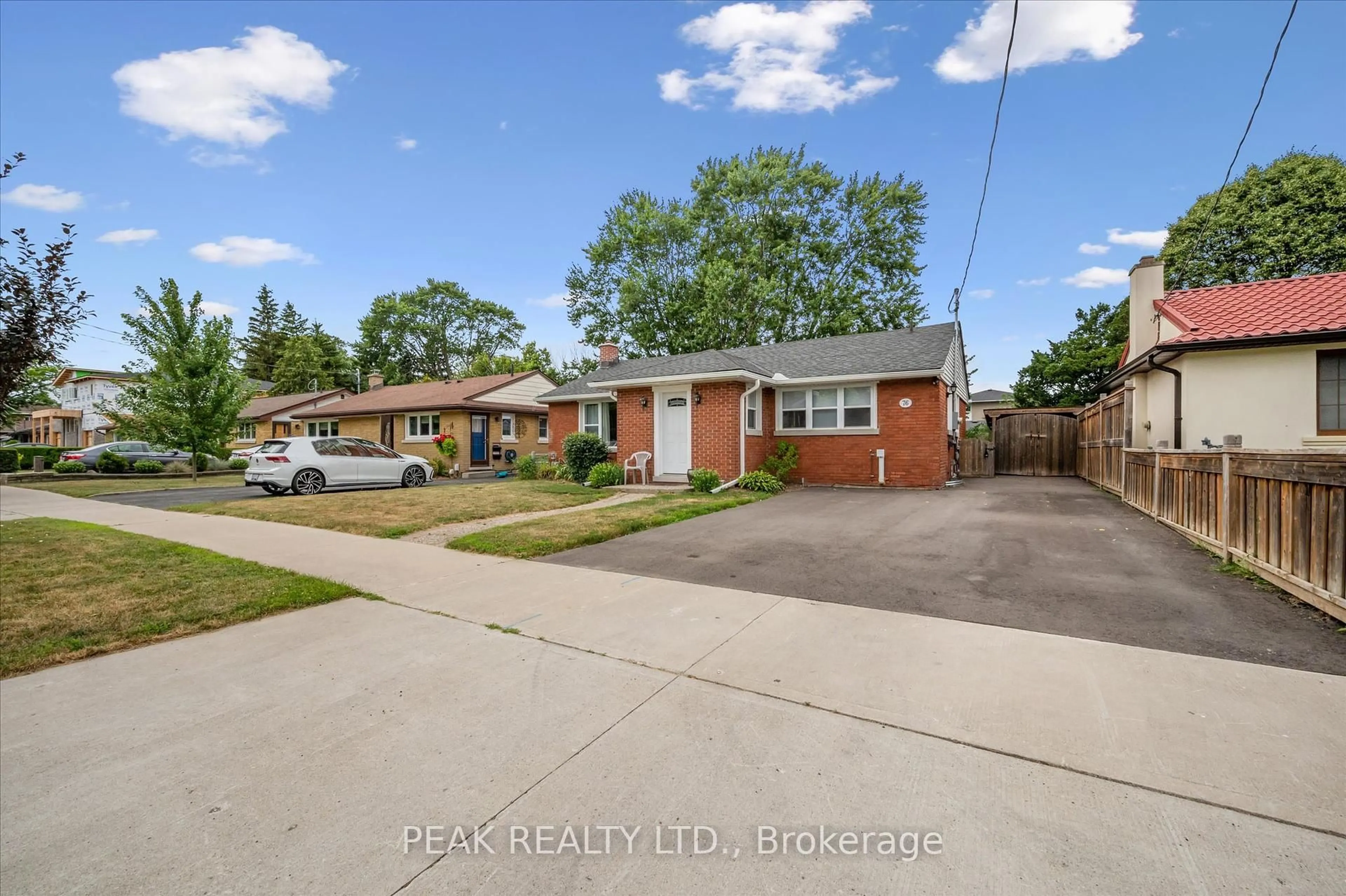 Home with brick exterior material, street for 76 Third Ave, Kitchener Ontario N2C 1N6