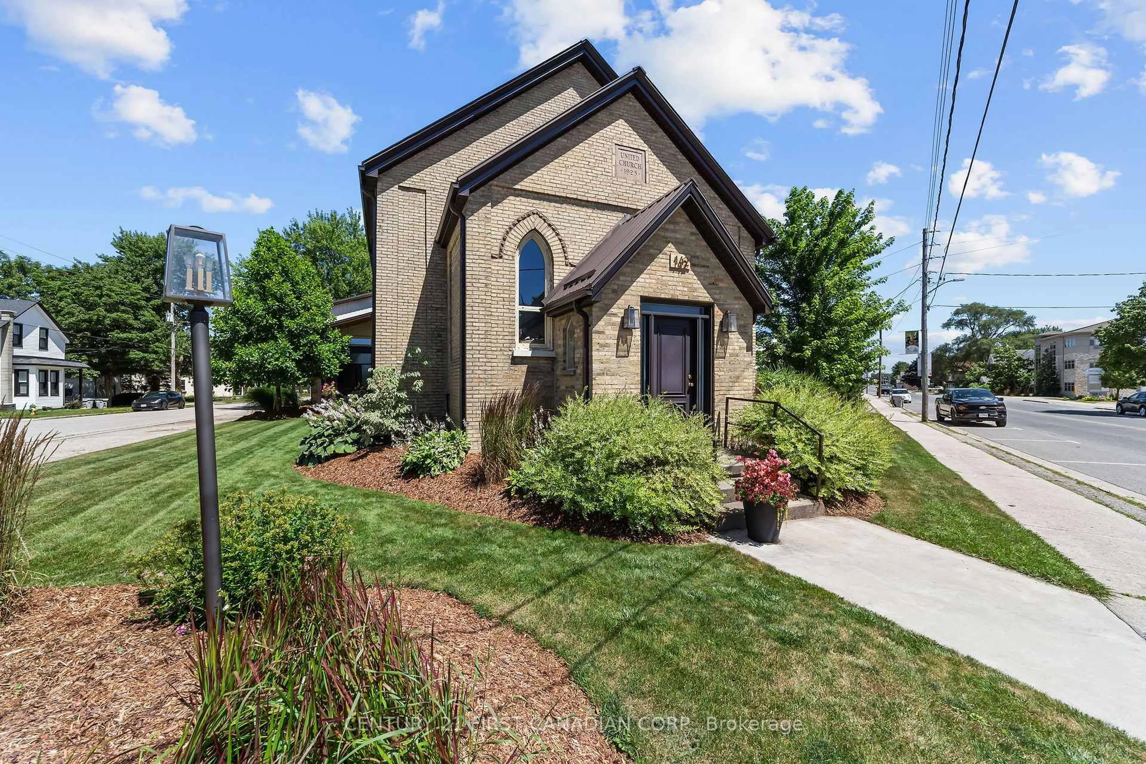 Home with brick exterior material, street for 142 Main St, Lucan Biddulph Ontario N0M 2J0