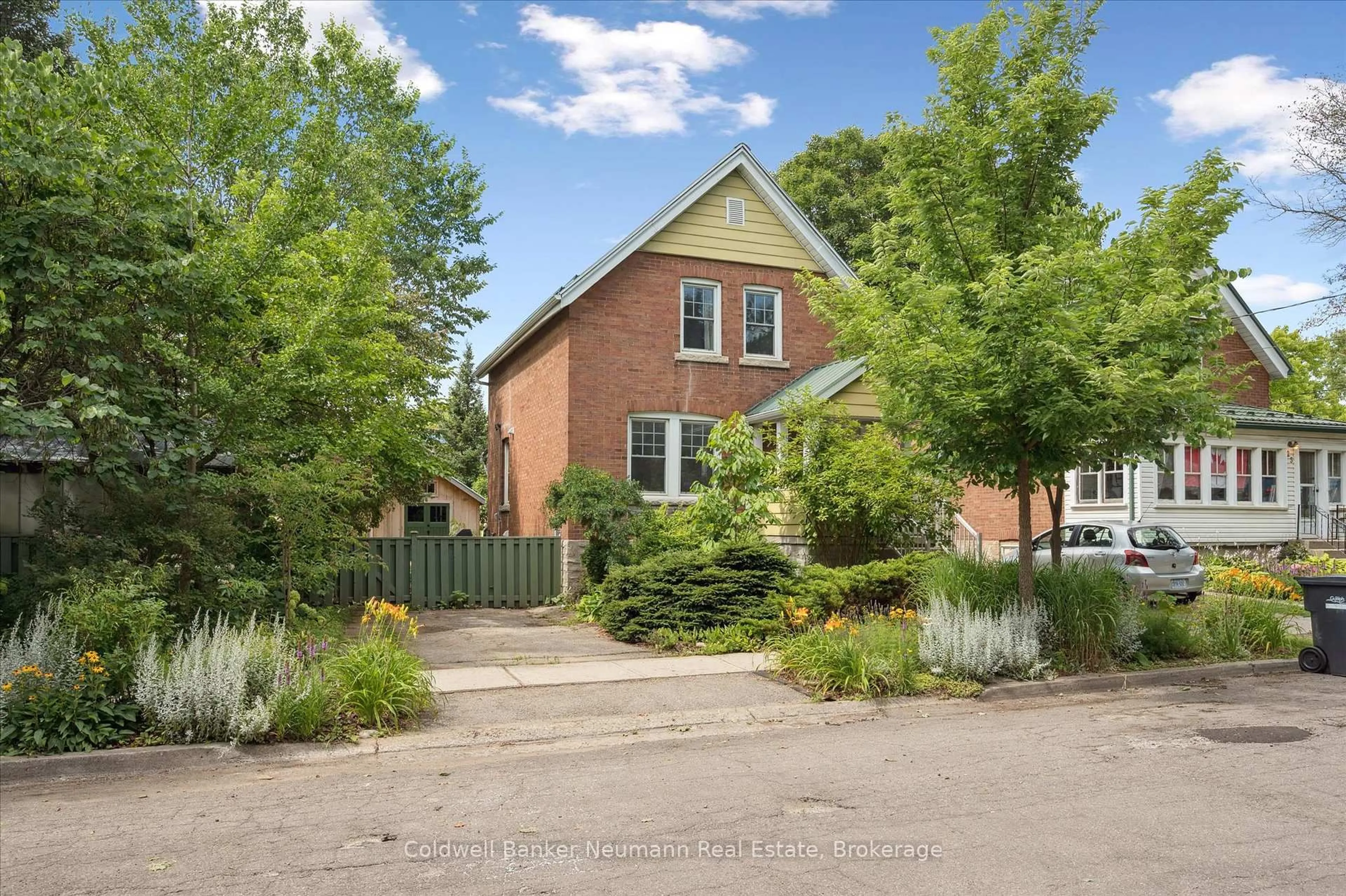 Home with brick exterior material, street for 27 Lawrence Ave, Guelph Ontario N1E 5Y4