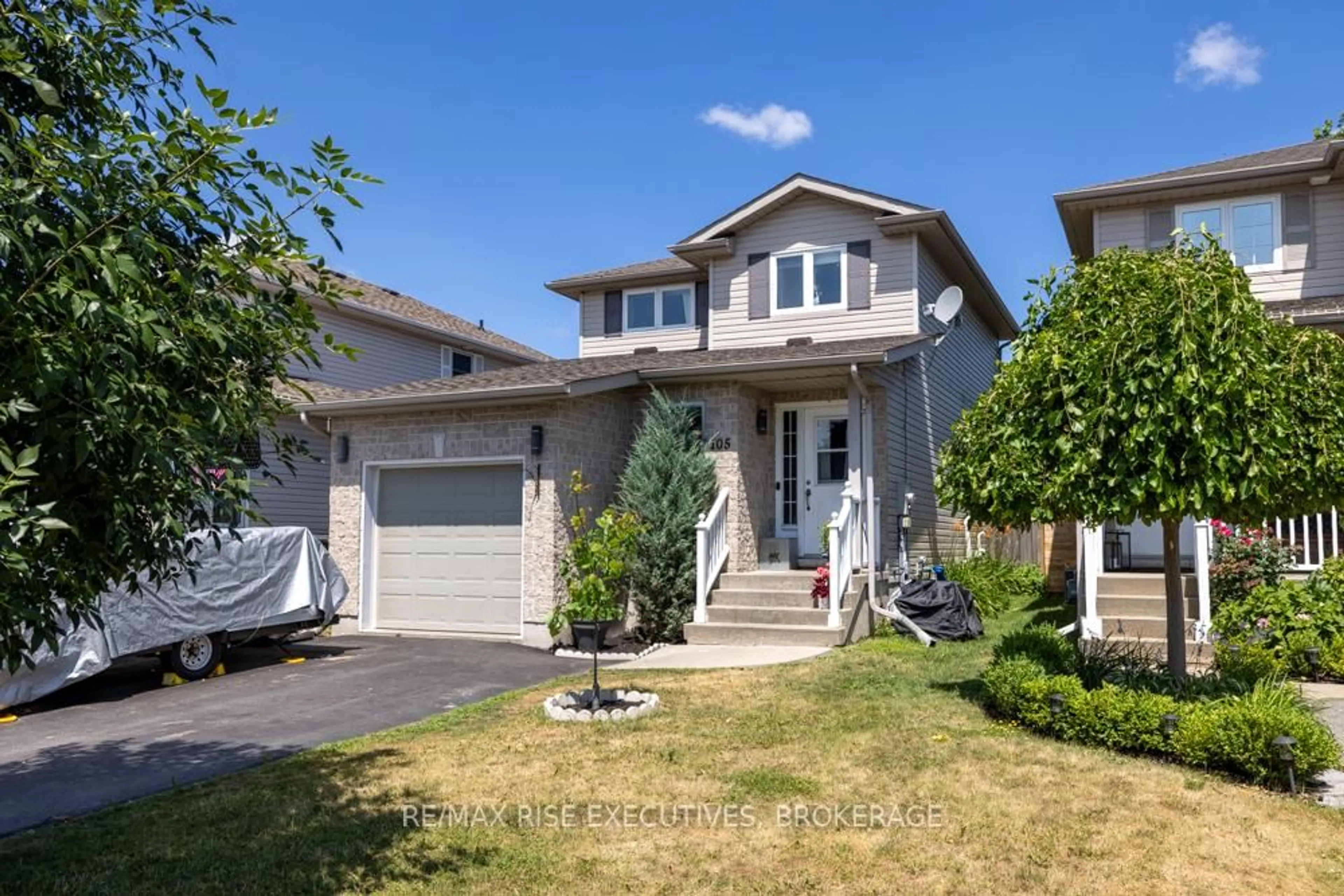 Home with vinyl exterior material, street for 105 McKeown Cres, Loyalist Ontario K7N 1Y5