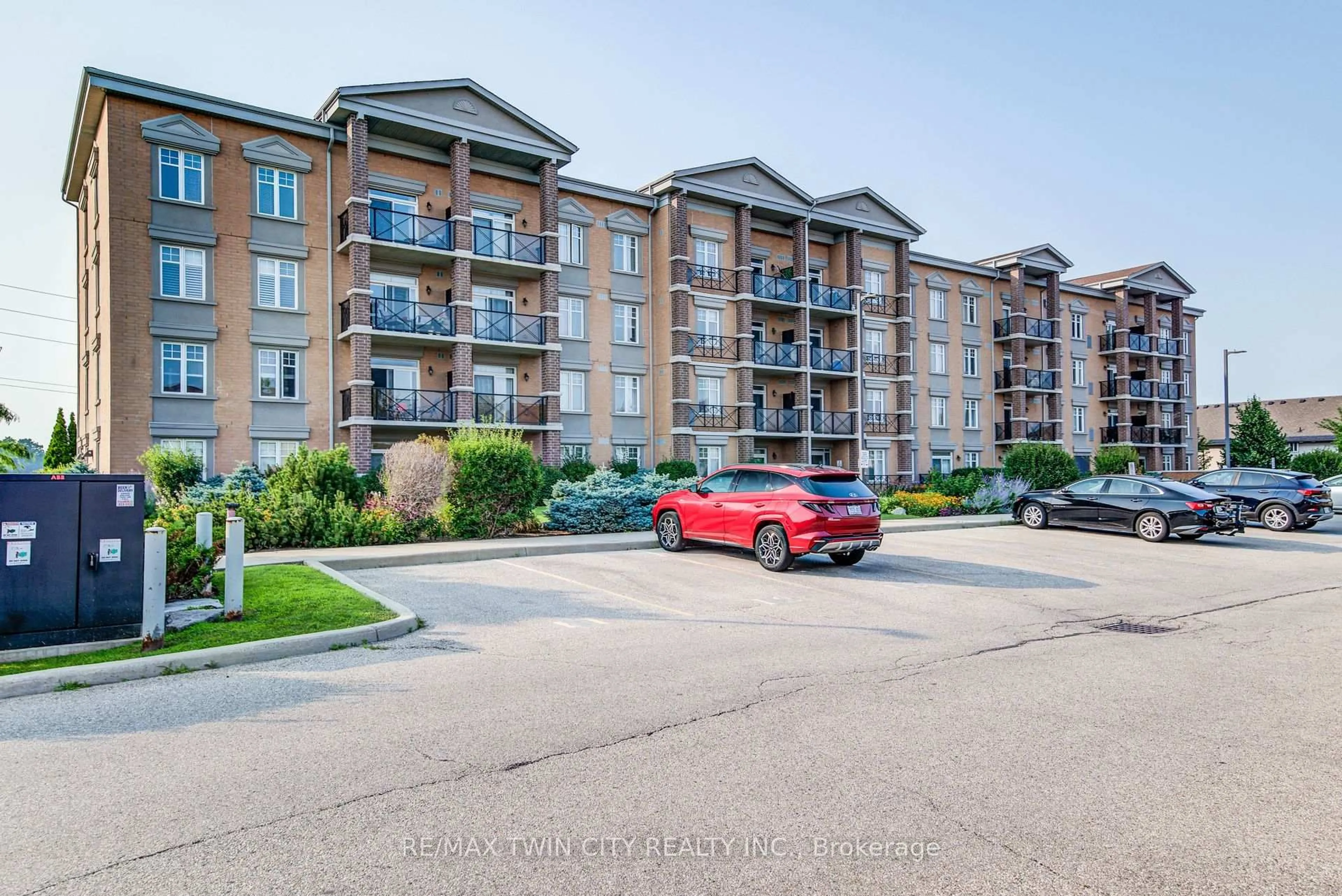 A pic from outside/outdoor area/front of a property/back of a property/a pic from drone, unknown for 2 Colonial Dr #401, Guelph Ontario N1L 0K8