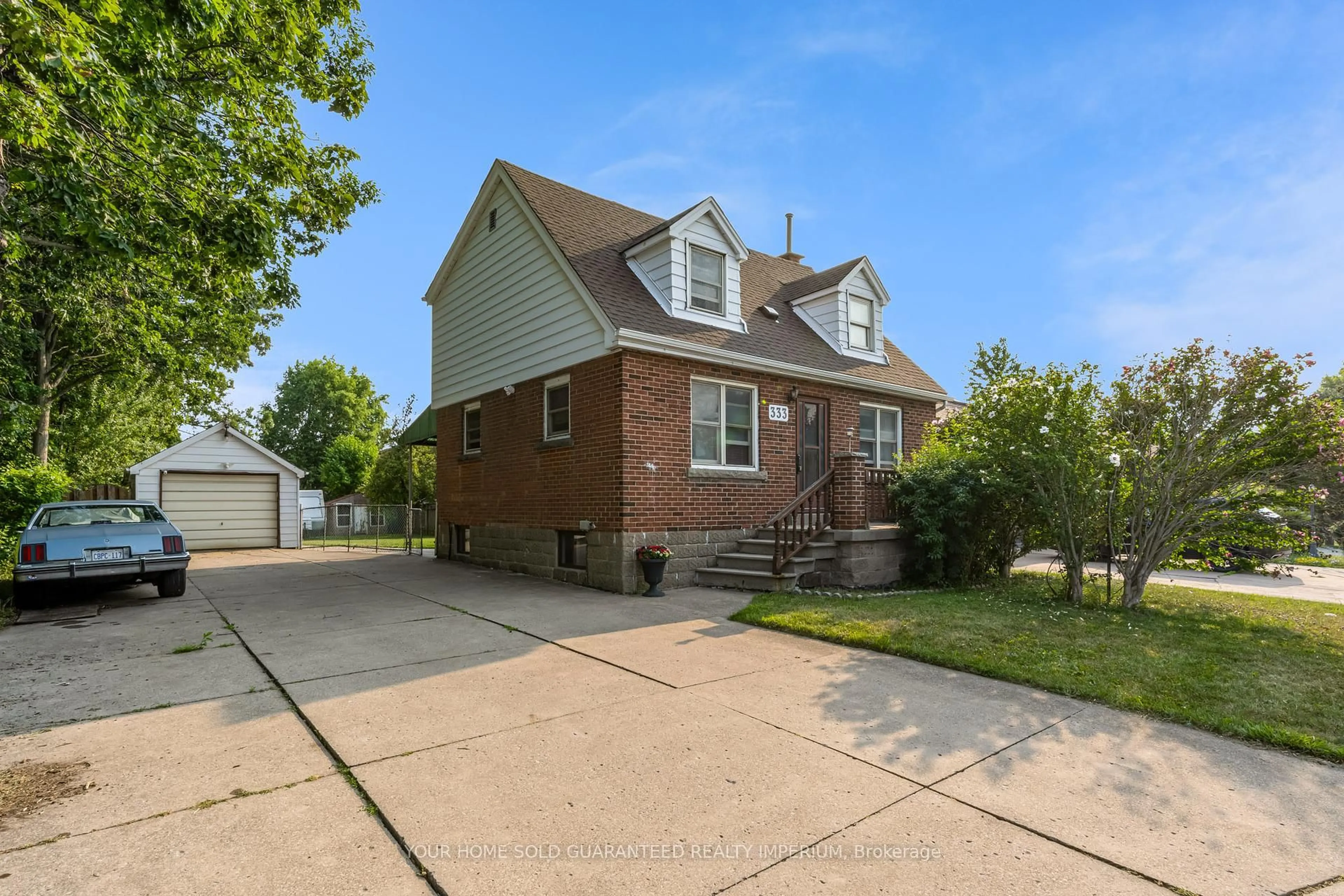 Home with brick exterior material, street for 333 LIMERIDGE Rd, Hamilton Ontario L9A 2S8