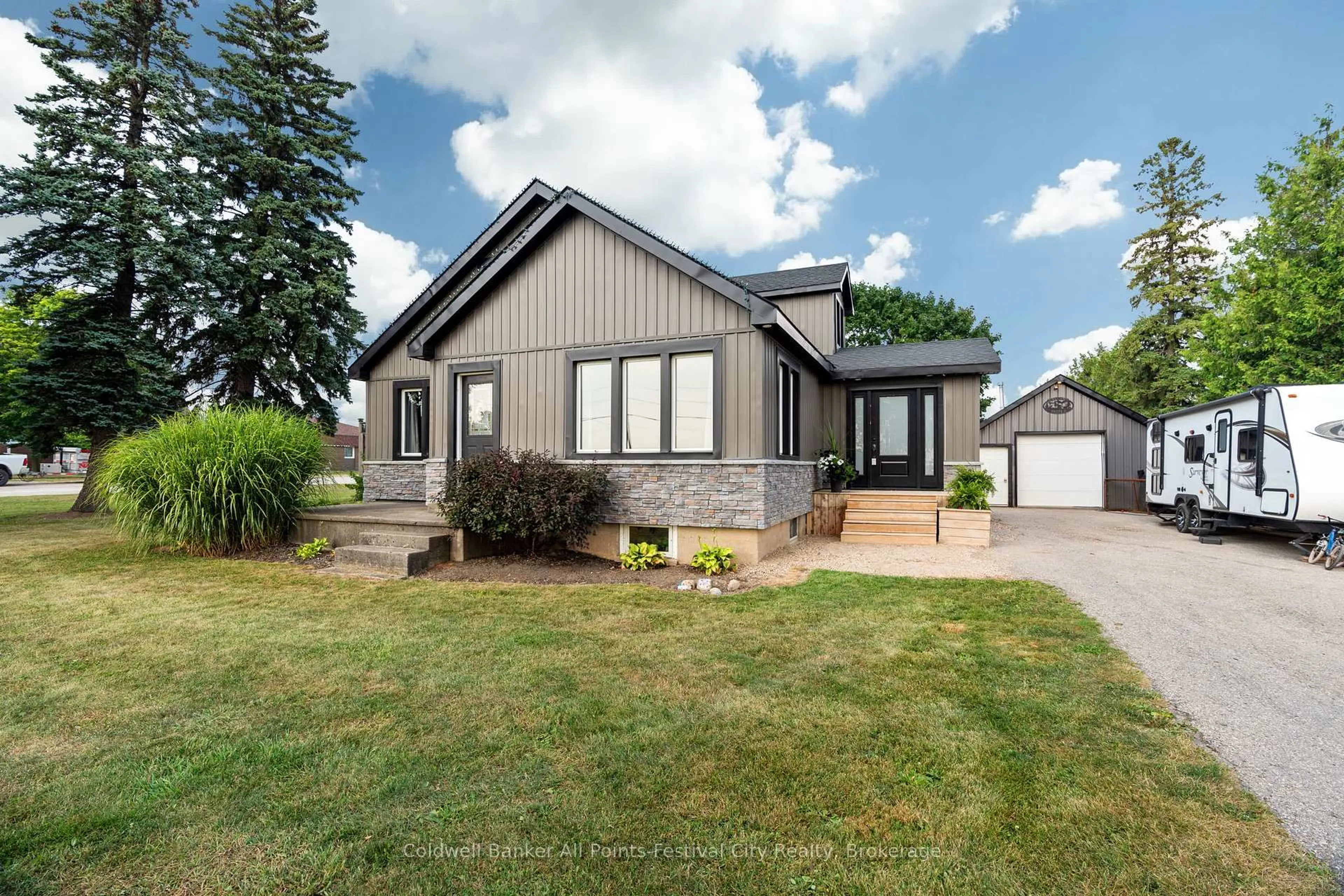 Home with vinyl exterior material, street for 8 London Rd, Huron East Ontario N0M 1J0