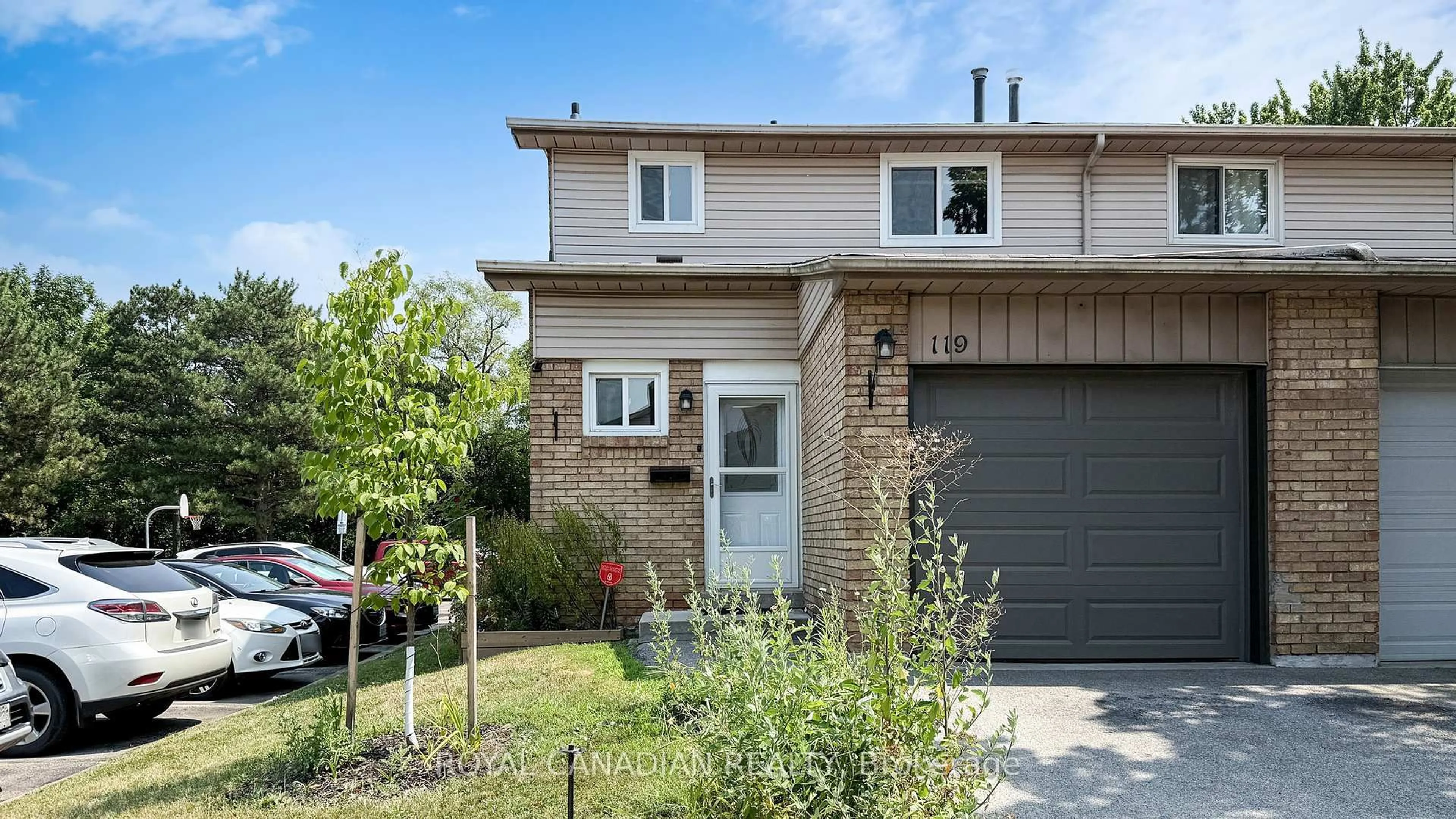Home with vinyl exterior material, street for 100 Quigley Rd #119, Hamilton Ontario L8K 6J1