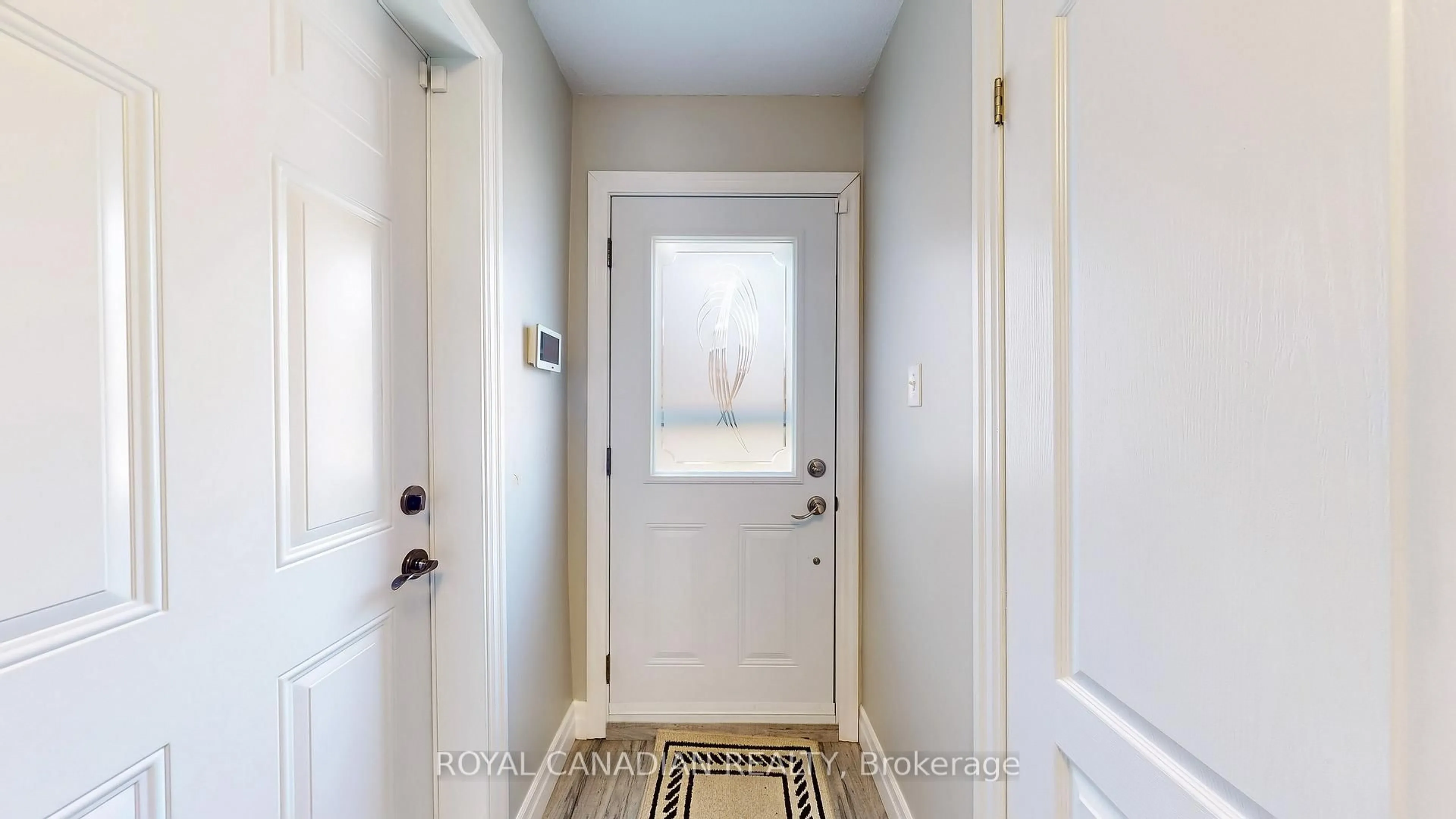 Indoor entryway for 100 Quigley Rd #119, Hamilton Ontario L8K 6J1