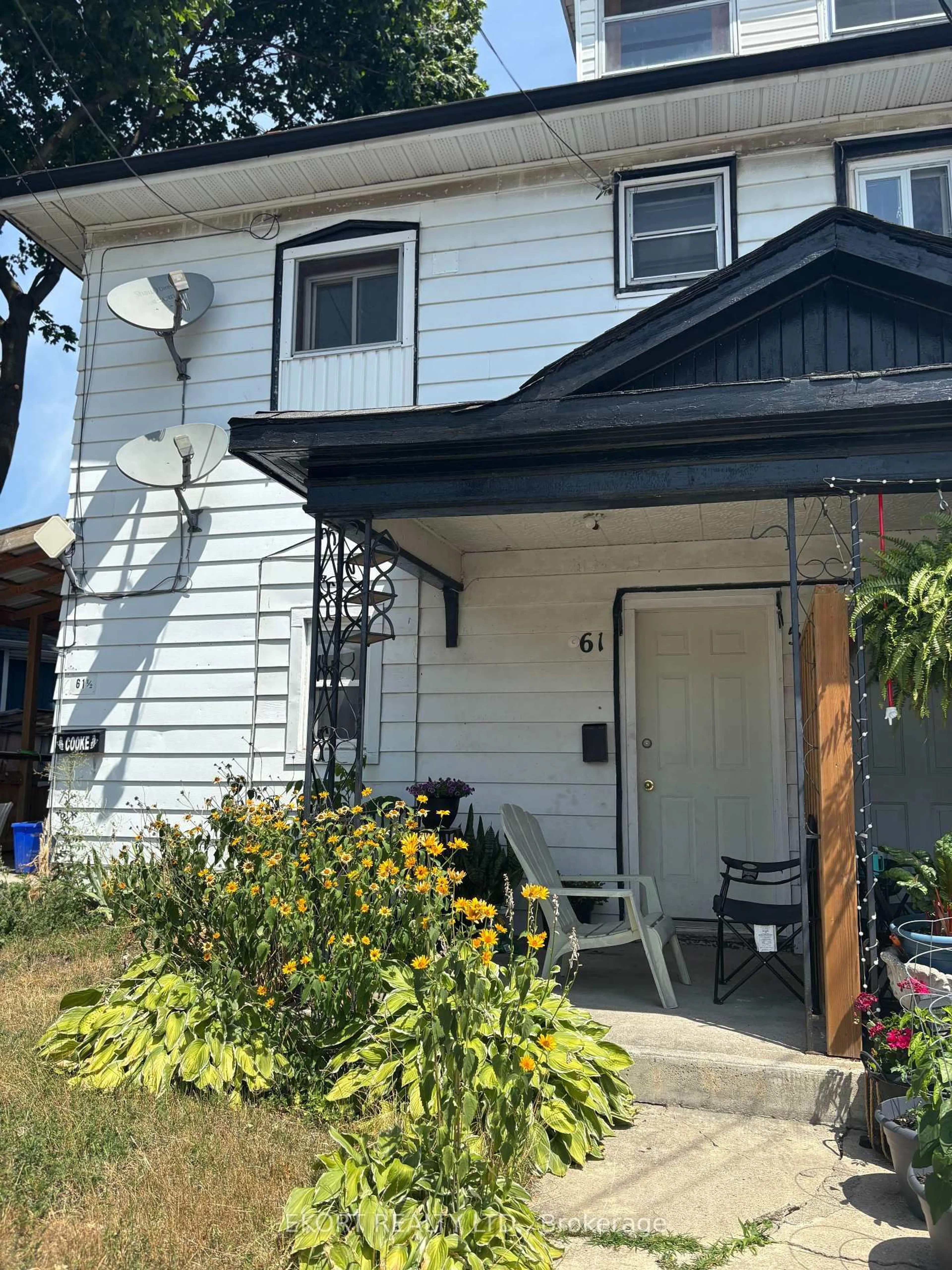 Home with vinyl exterior material, street for 59-61 St Charles St, Belleville Ontario K8P 2W1
