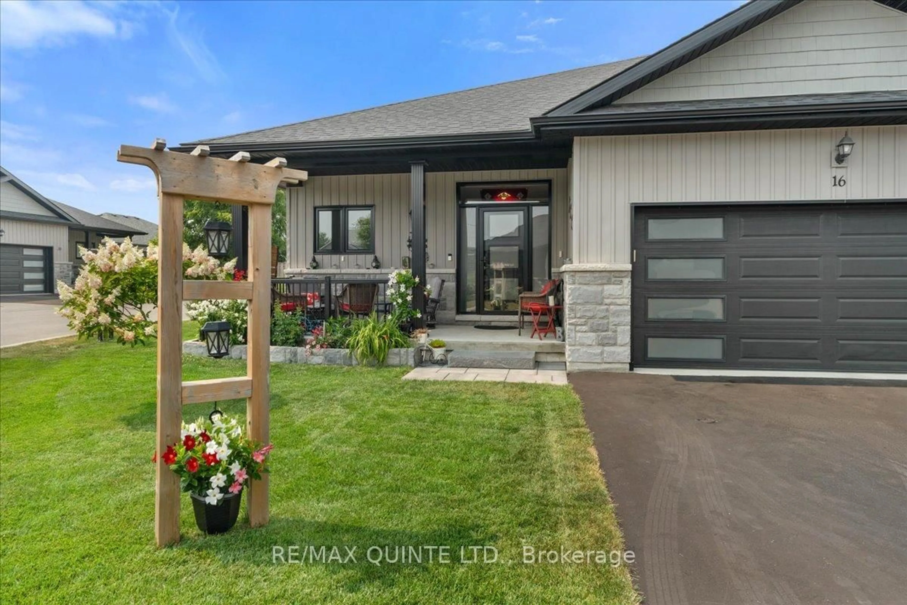 Home with vinyl exterior material, street for 39 Downes Ave #16, Prince Edward County Ontario K0K 2T0