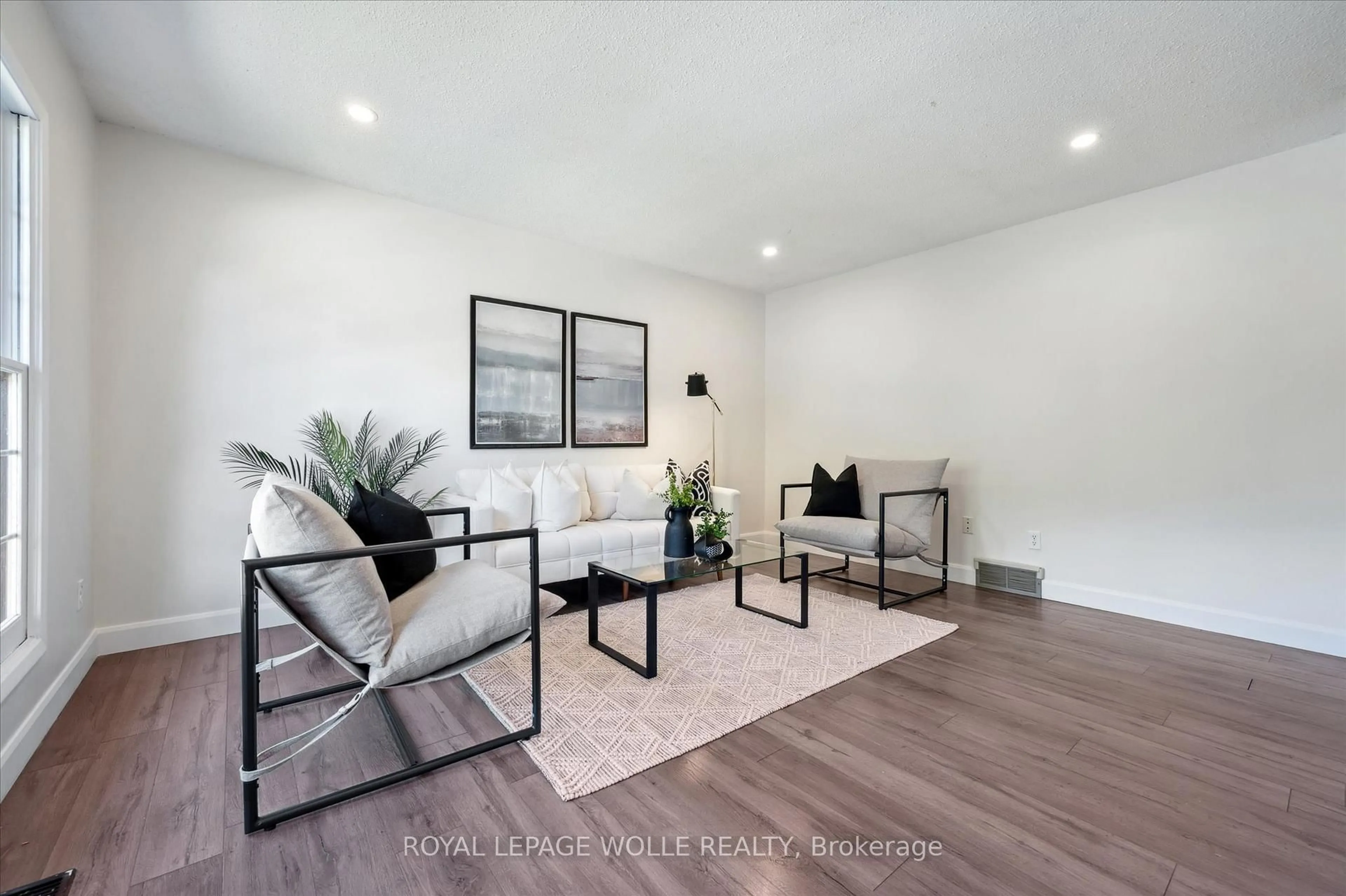 Living room with furniture, wood/laminate floor for 113 Matthew St, Kitchener Ontario N2B 3J9