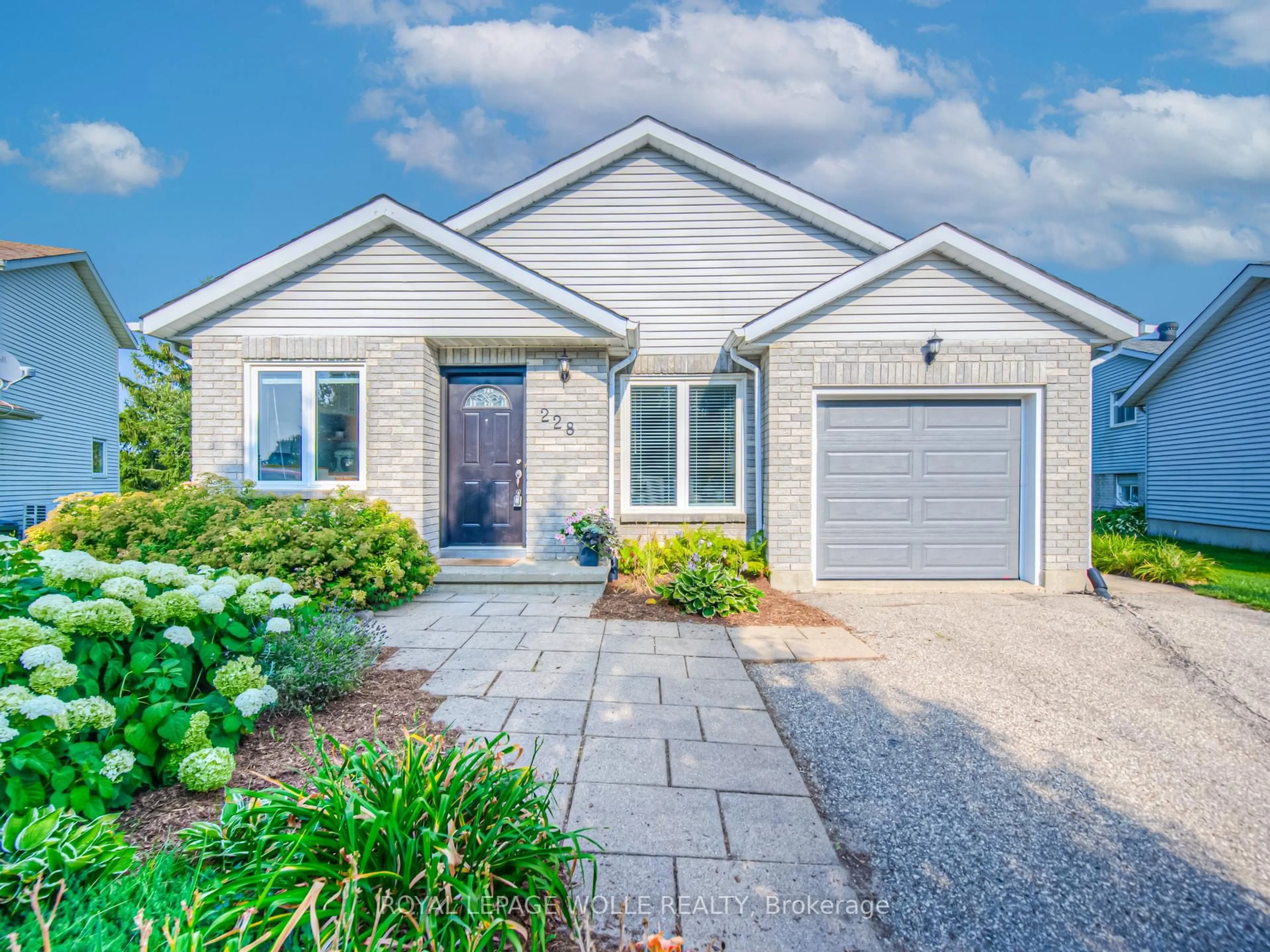 Home with brick exterior material, street for 228 Haldane Crt, Waterloo Ontario N2T 1T7