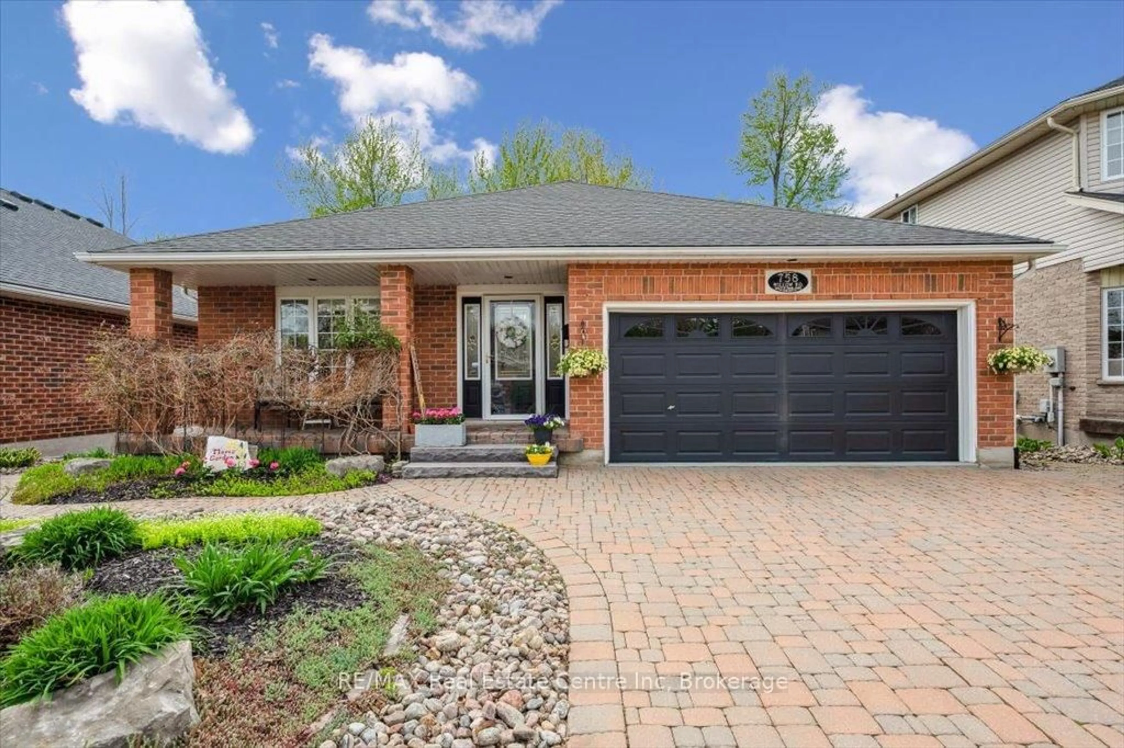 Home with brick exterior material, street for 758 Willow Rd, Guelph Ontario N1K 1Z2