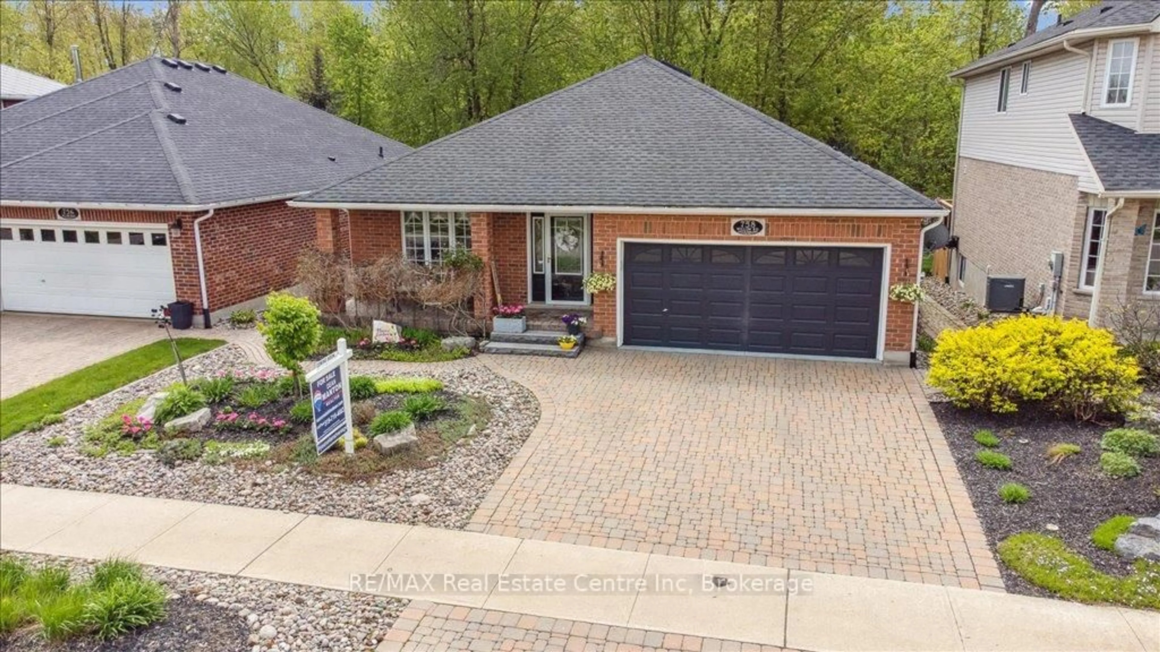 Home with brick exterior material, street for 758 Willow Rd, Guelph Ontario N1K 1Z2