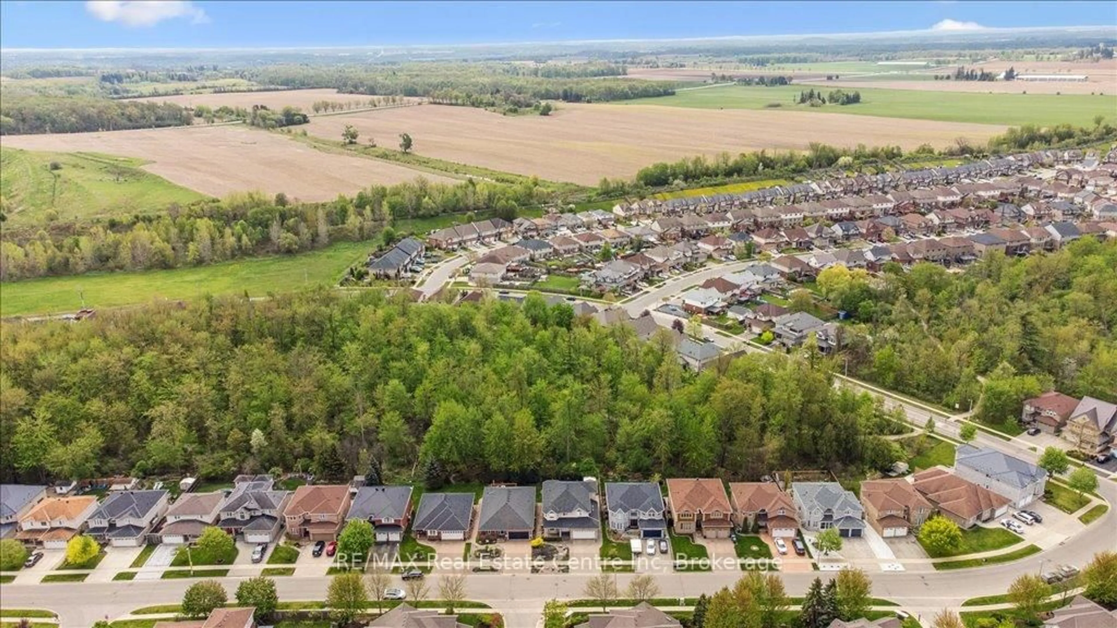 A pic from outside/outdoor area/front of a property/back of a property/a pic from drone, street for 758 Willow Rd, Guelph Ontario N1K 1Z2