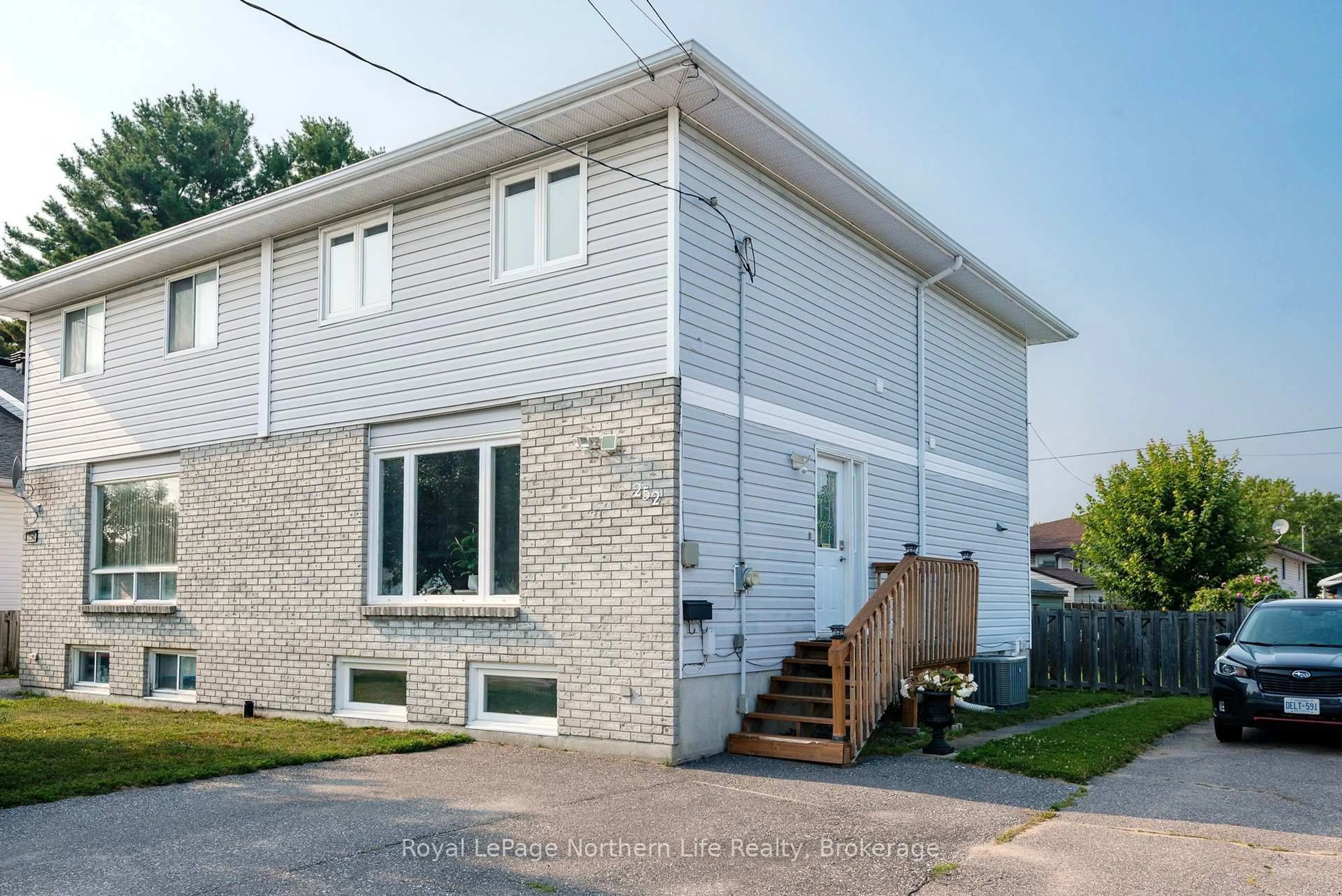Home with brick exterior material, street for 252 Gould Ave, North Bay Ontario P1B 7C7