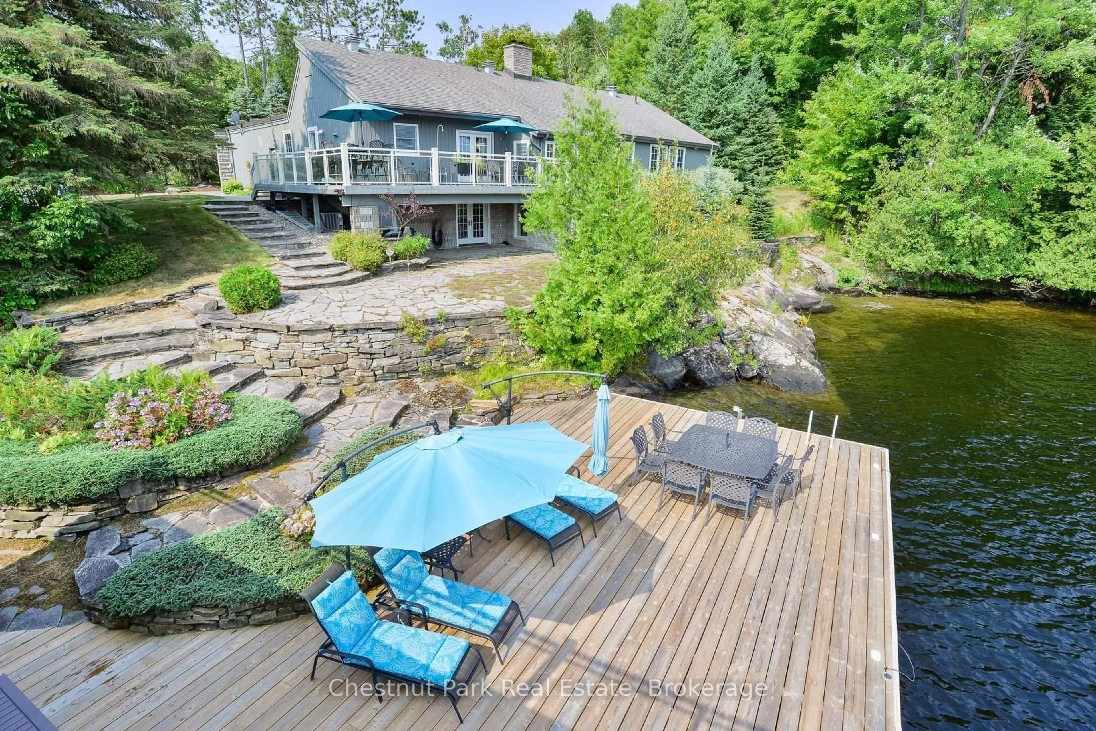 A pic from outside/outdoor area/front of a property/back of a property/a pic from drone, water/lake/river/ocean view for 1101 Greenwood Point Rd, Muskoka Lakes Ontario P1P 1R2