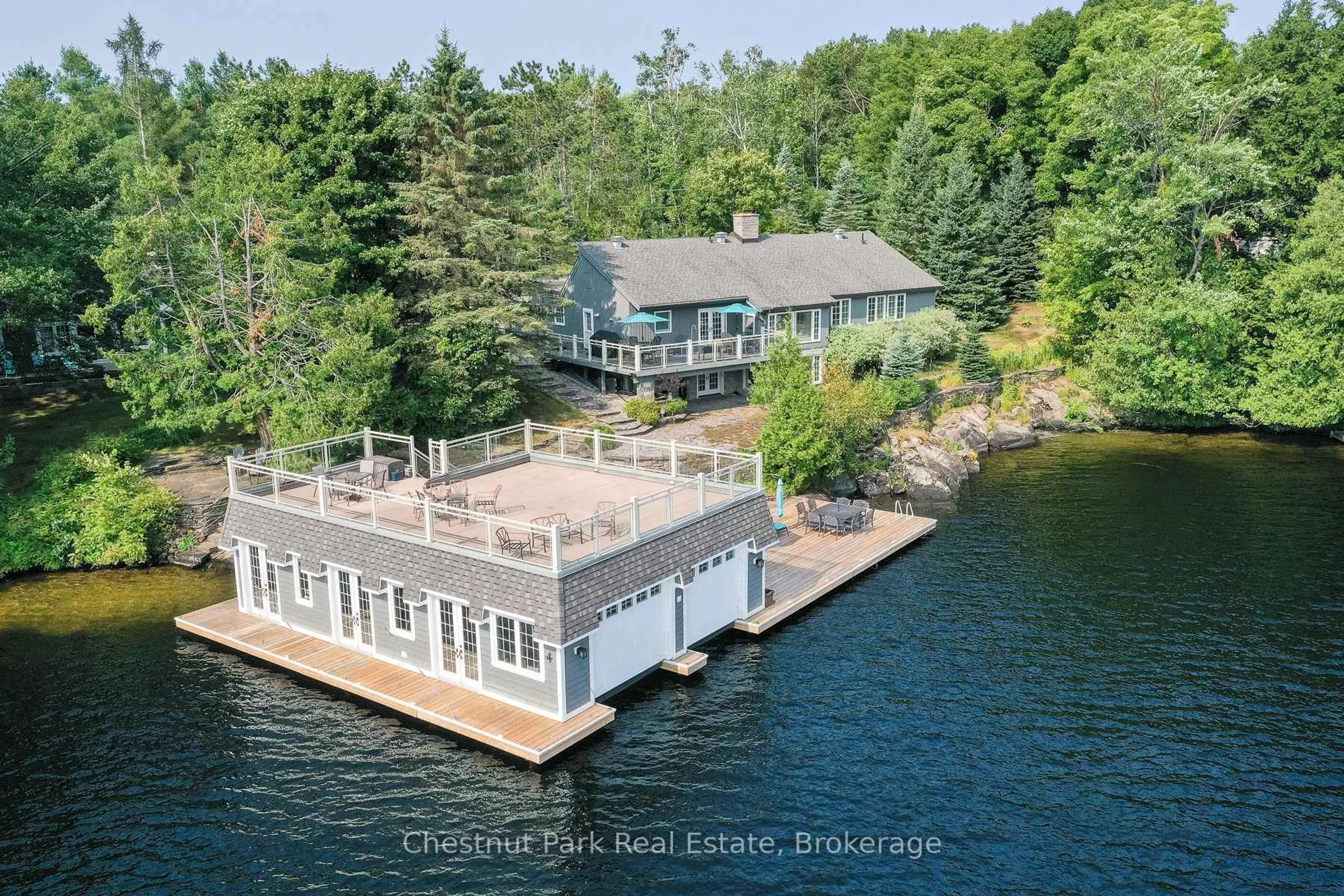 A pic from outside/outdoor area/front of a property/back of a property/a pic from drone, water/lake/river/ocean view for 1101 Greenwood Point Rd, Muskoka Lakes Ontario P1P 1R2