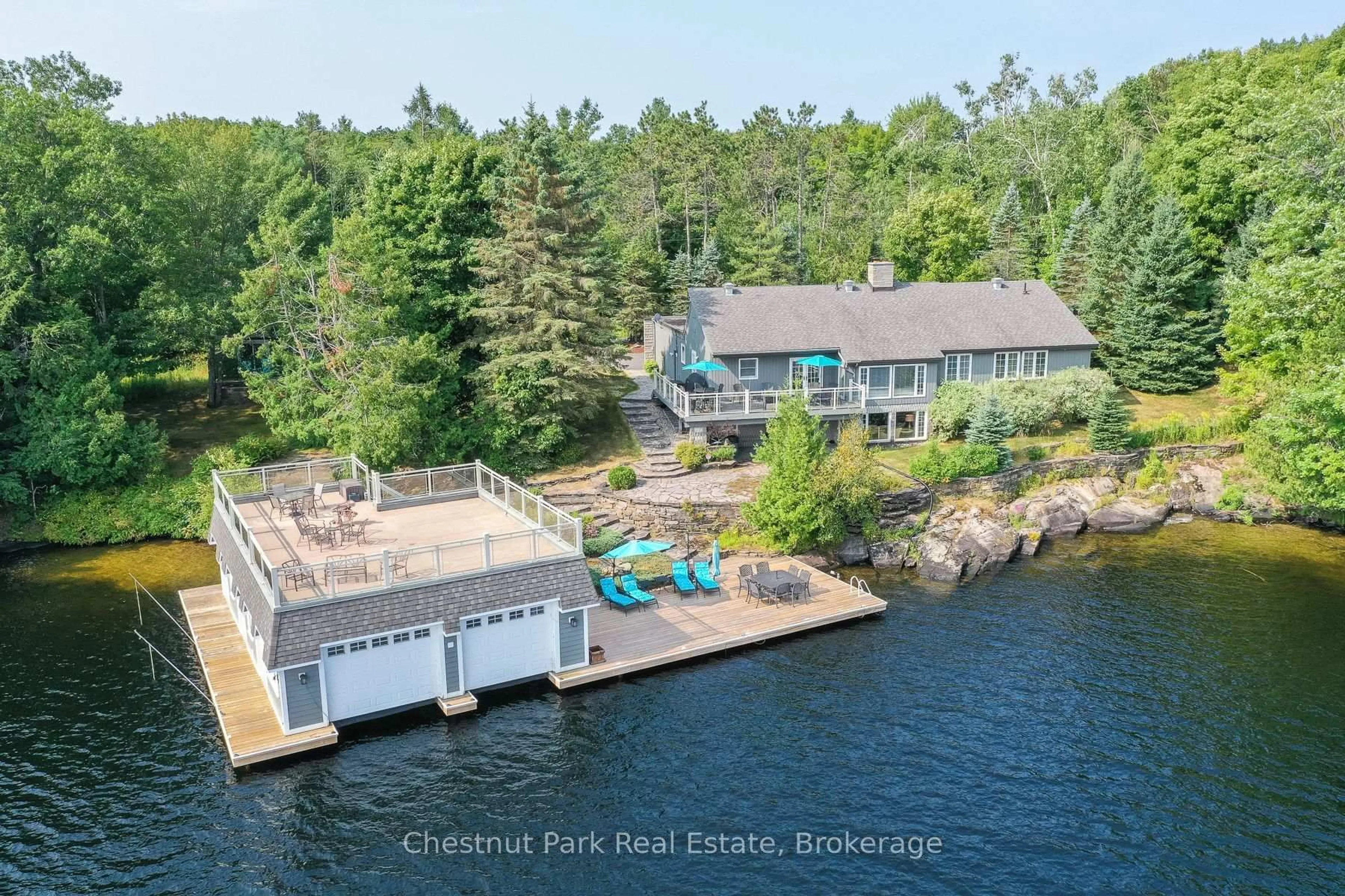A pic from outside/outdoor area/front of a property/back of a property/a pic from drone, water/lake/river/ocean view for 1101 Greenwood Point Rd, Muskoka Lakes Ontario P1P 1R2
