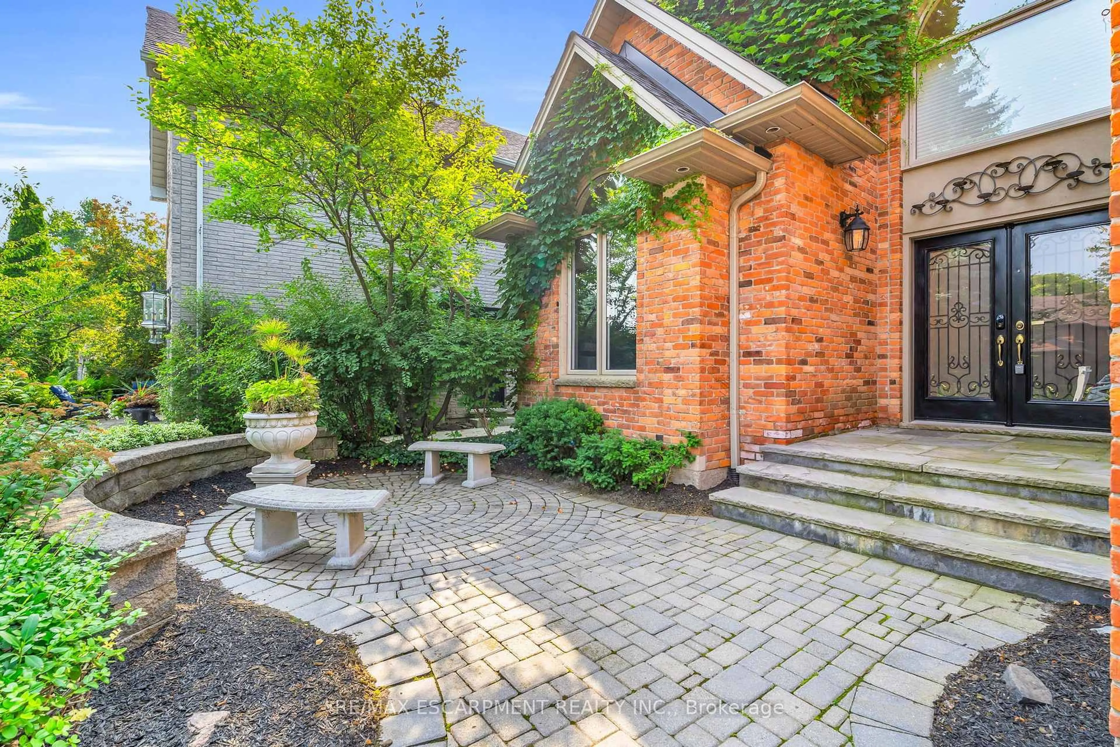 Home with brick exterior material, street for 484 Bush Dr, Hamilton Ontario L9G 4T4