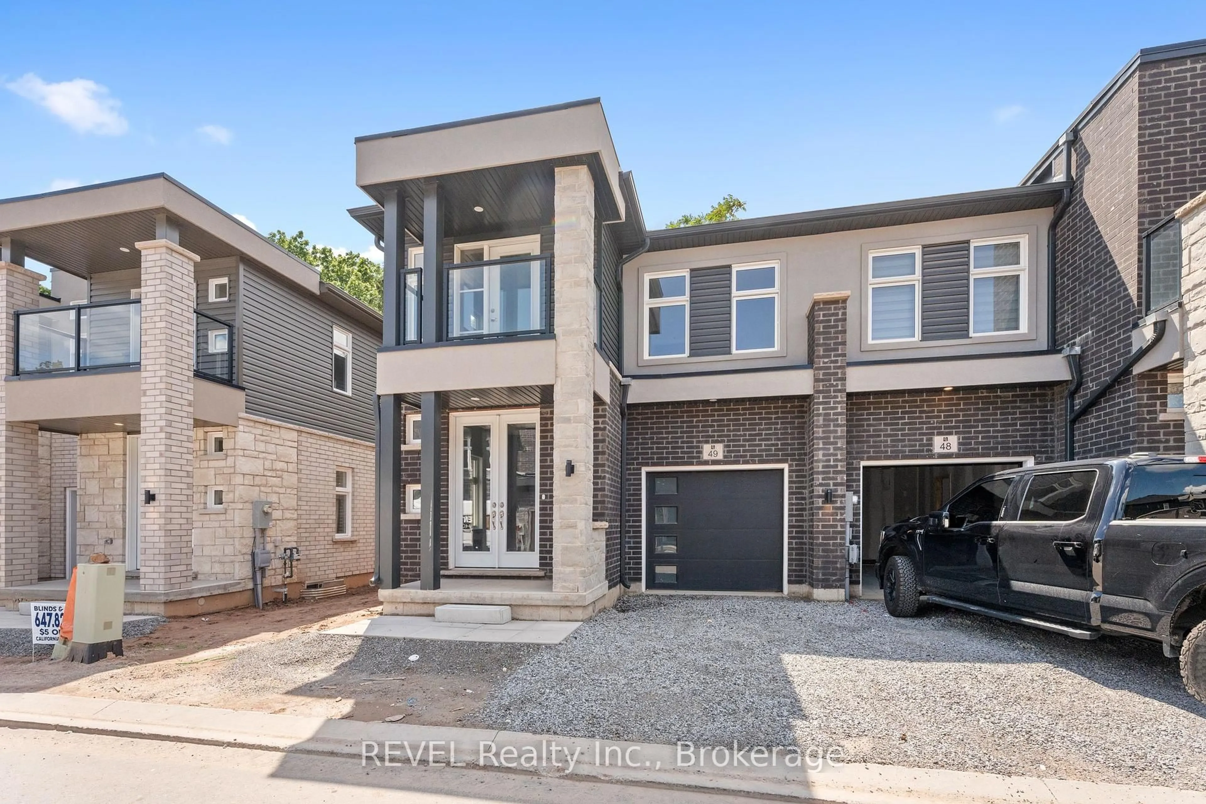 Home with brick exterior material, street for 5672 Dorchester Rd #49, Niagara Falls Ontario L2G 5S3