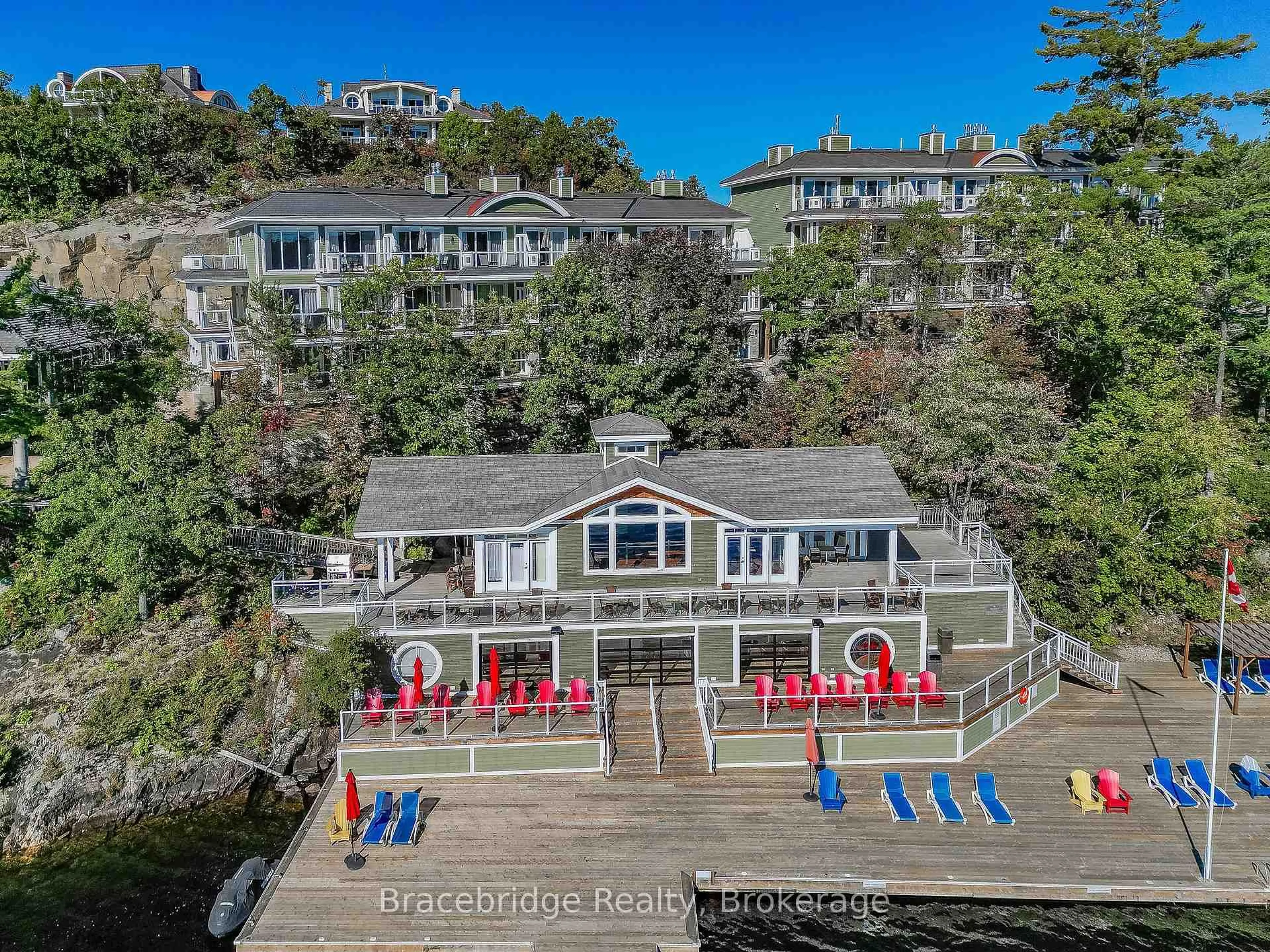 A pic from outside/outdoor area/front of a property/back of a property/a pic from drone, water/lake/river/ocean view for 1869 Muskoka 118 Highway #L205-B1, Muskoka Lakes Ontario P1L 1W8