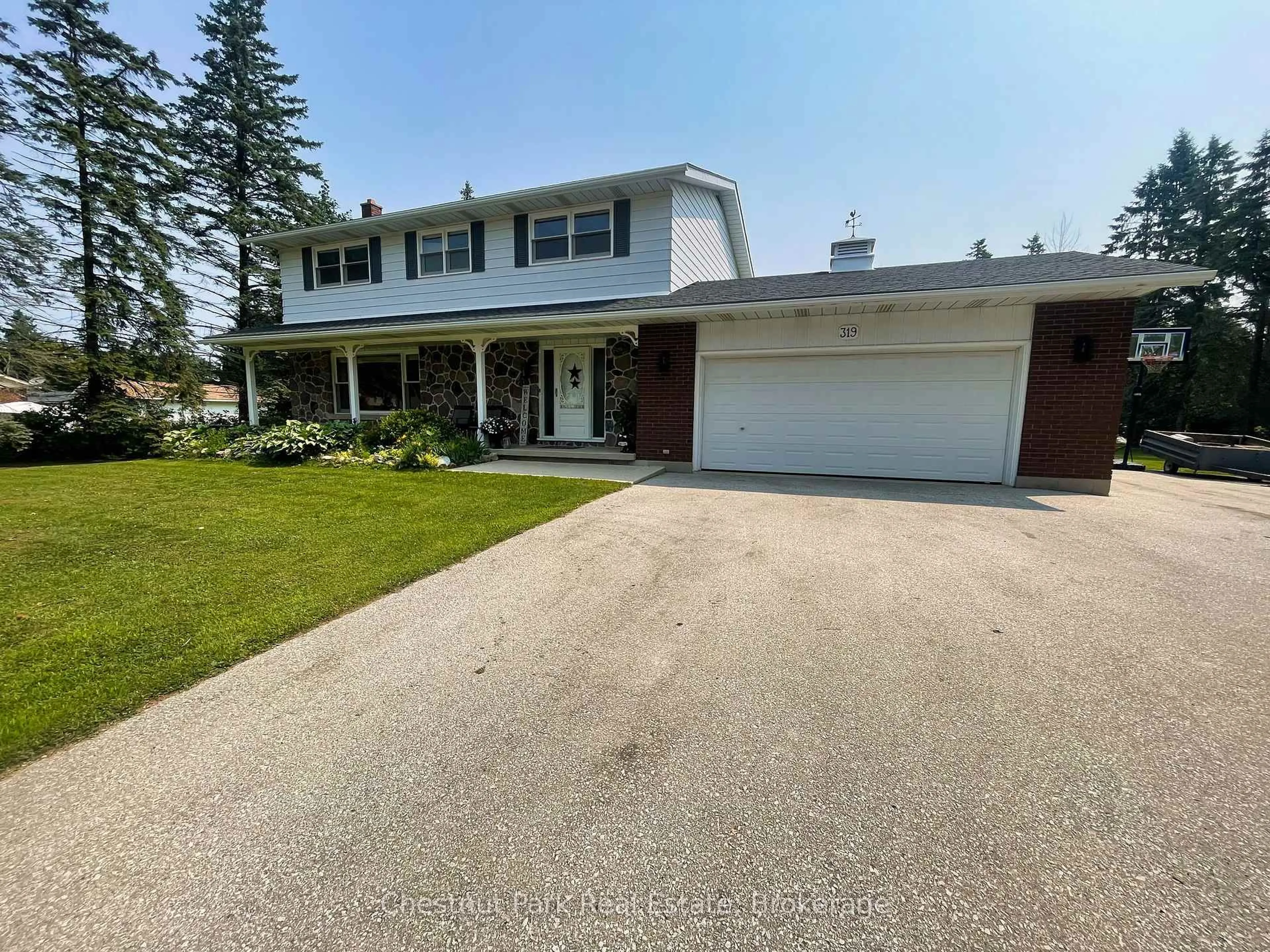 A pic from outside/outdoor area/front of a property/back of a property/a pic from drone, street for 319 Gould St, South Bruce Peninsula Ontario N0H 2T0